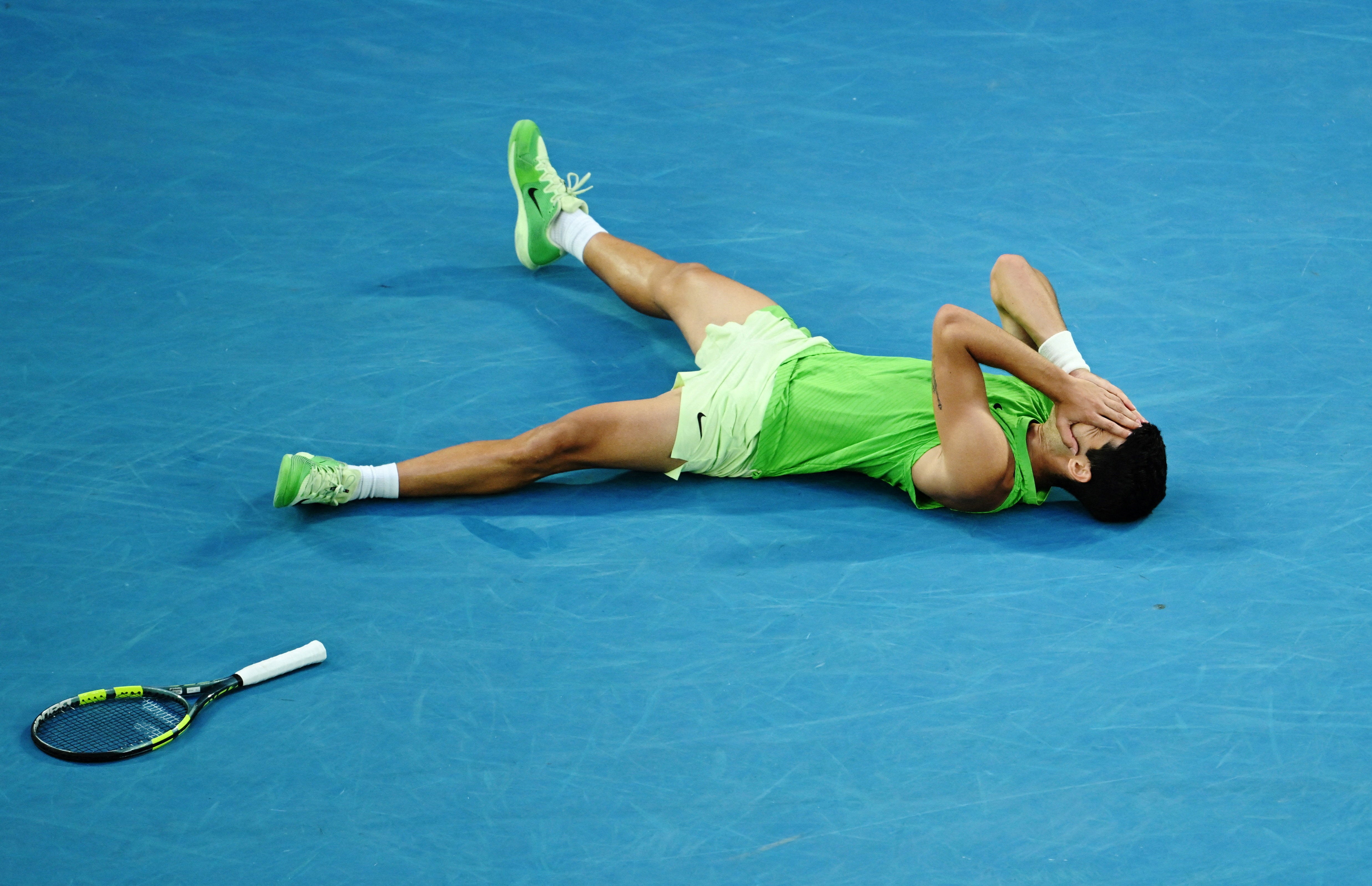 Carlos Alcaraz celebrates after winning his semi-final match against Alexander Zverev in five hours and 27 minutes