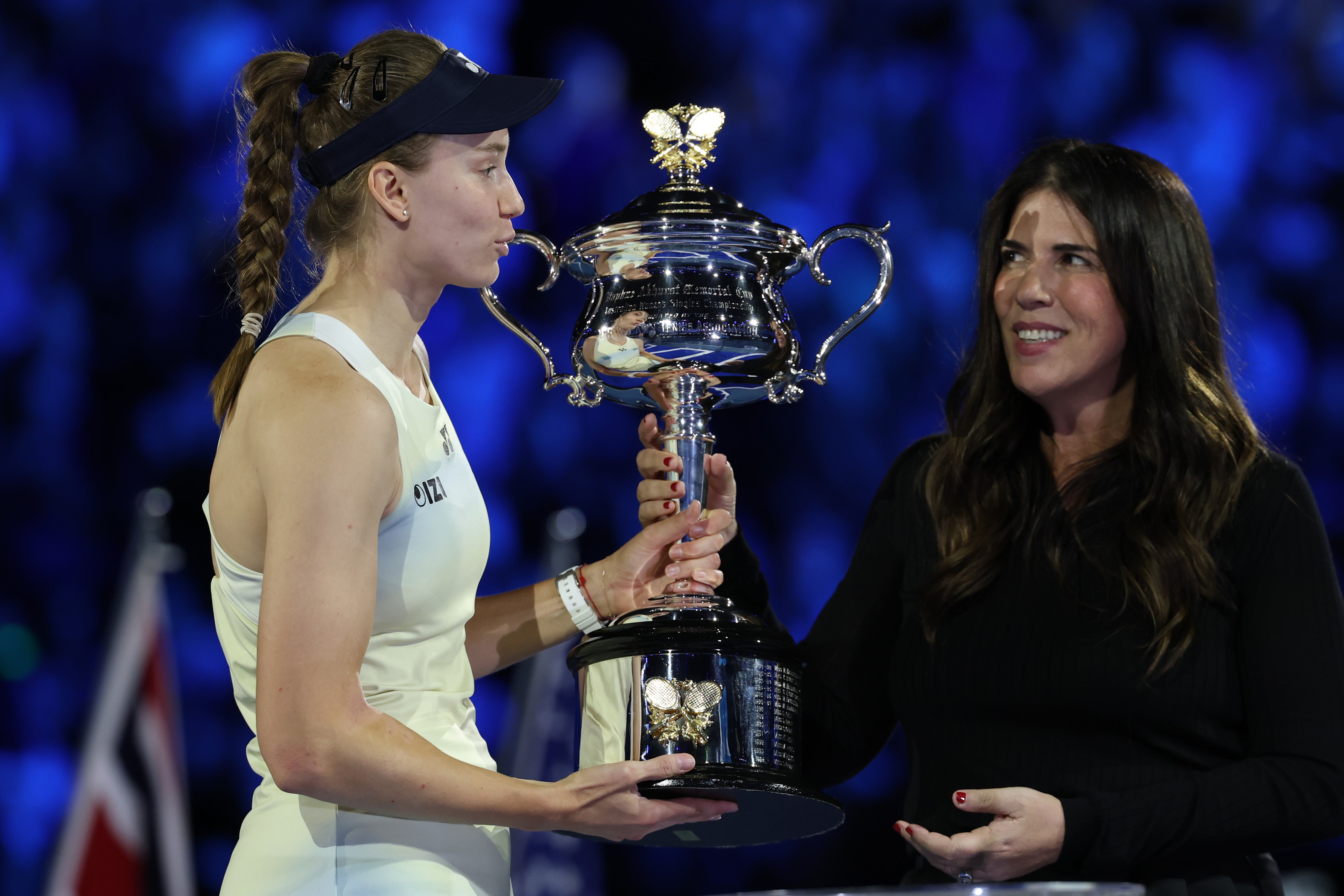 Elena Rybakina is presented the Daphne Akhurst Memorial Cup by Jennifer Capriati
