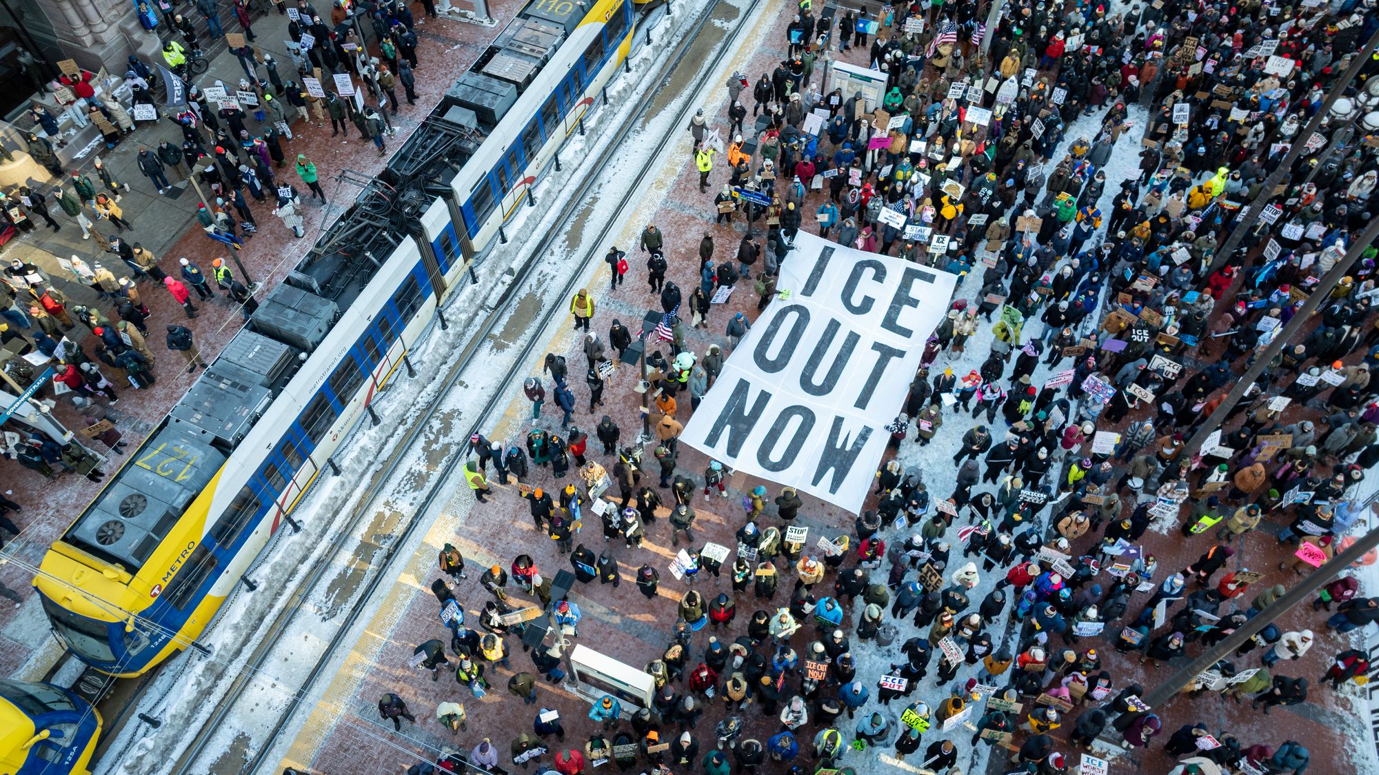 Thousands of protesters marched through Minneapolis Friday demanding that ICE withdraw from the city