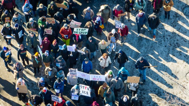 <p>Protesters stage a march calling for an end to taxpayer spending on ICE on Saturday in Minneapolis</p>