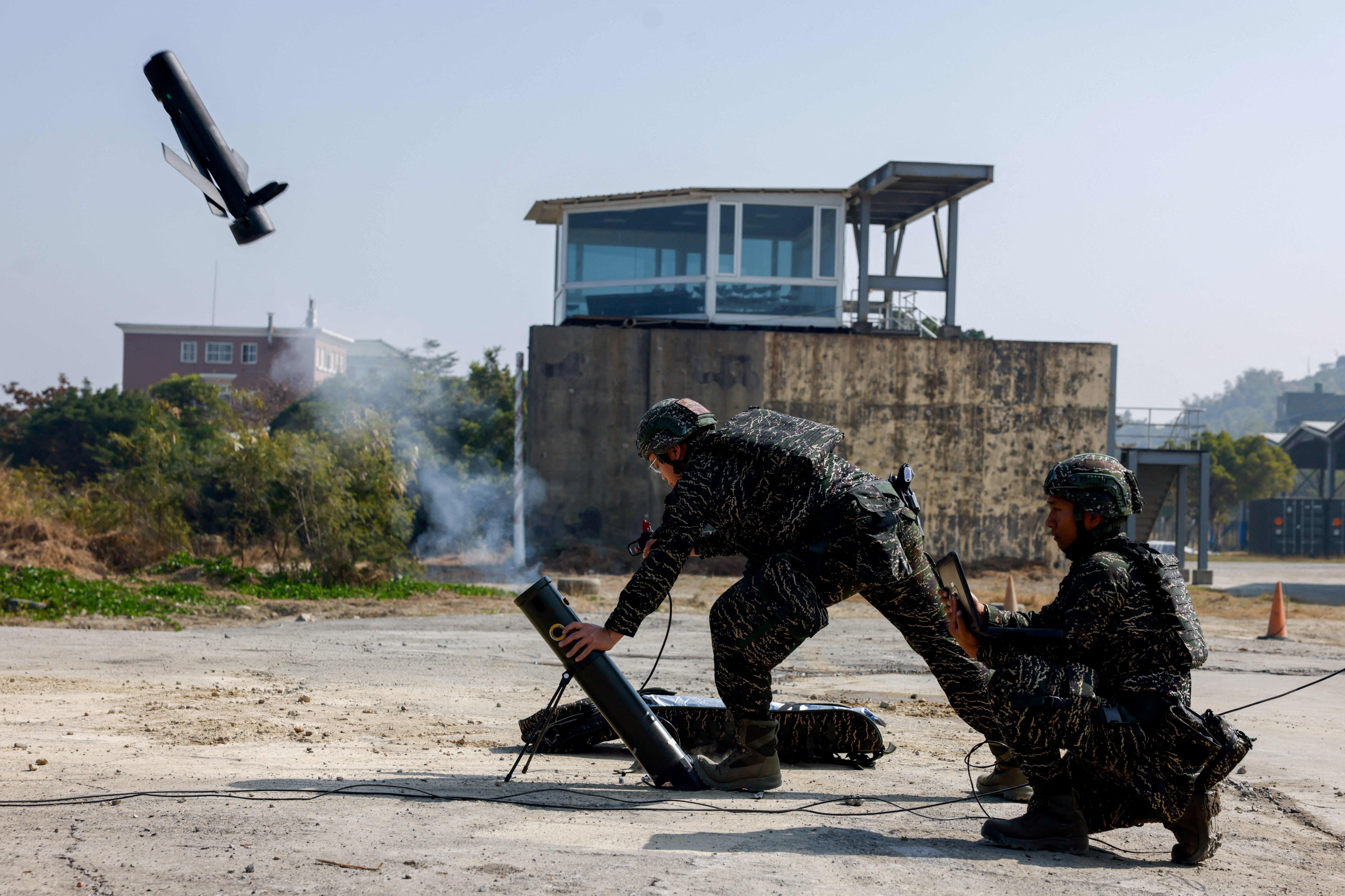 Soldiers operate a Taiwan-made attack drone during an annual military exercise