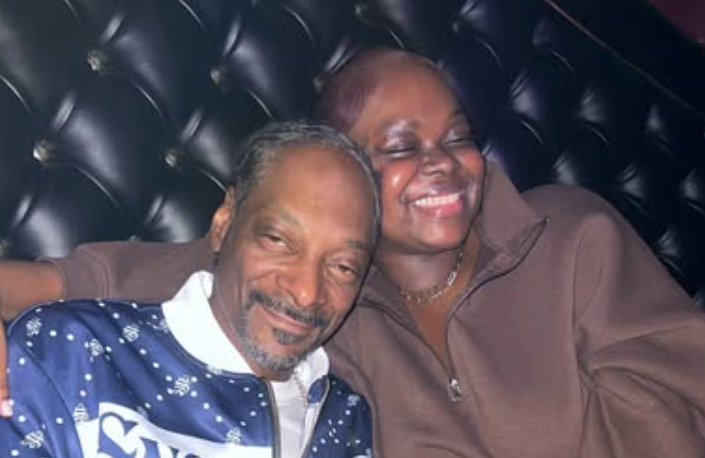 Snoop Dogg pictured with his daughter, Cori Broadus, who lost her baby daughter Codi at 10 months