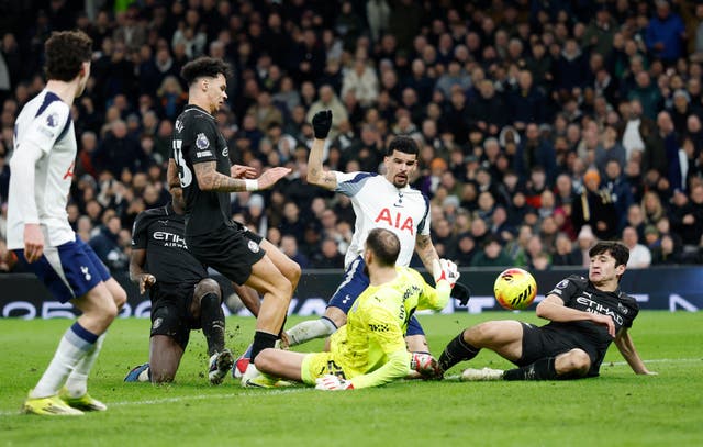 <p>Dominic Solanke appeared to kick through the back of Marc Guehi’s leg for Tottenham’s first goal</p>