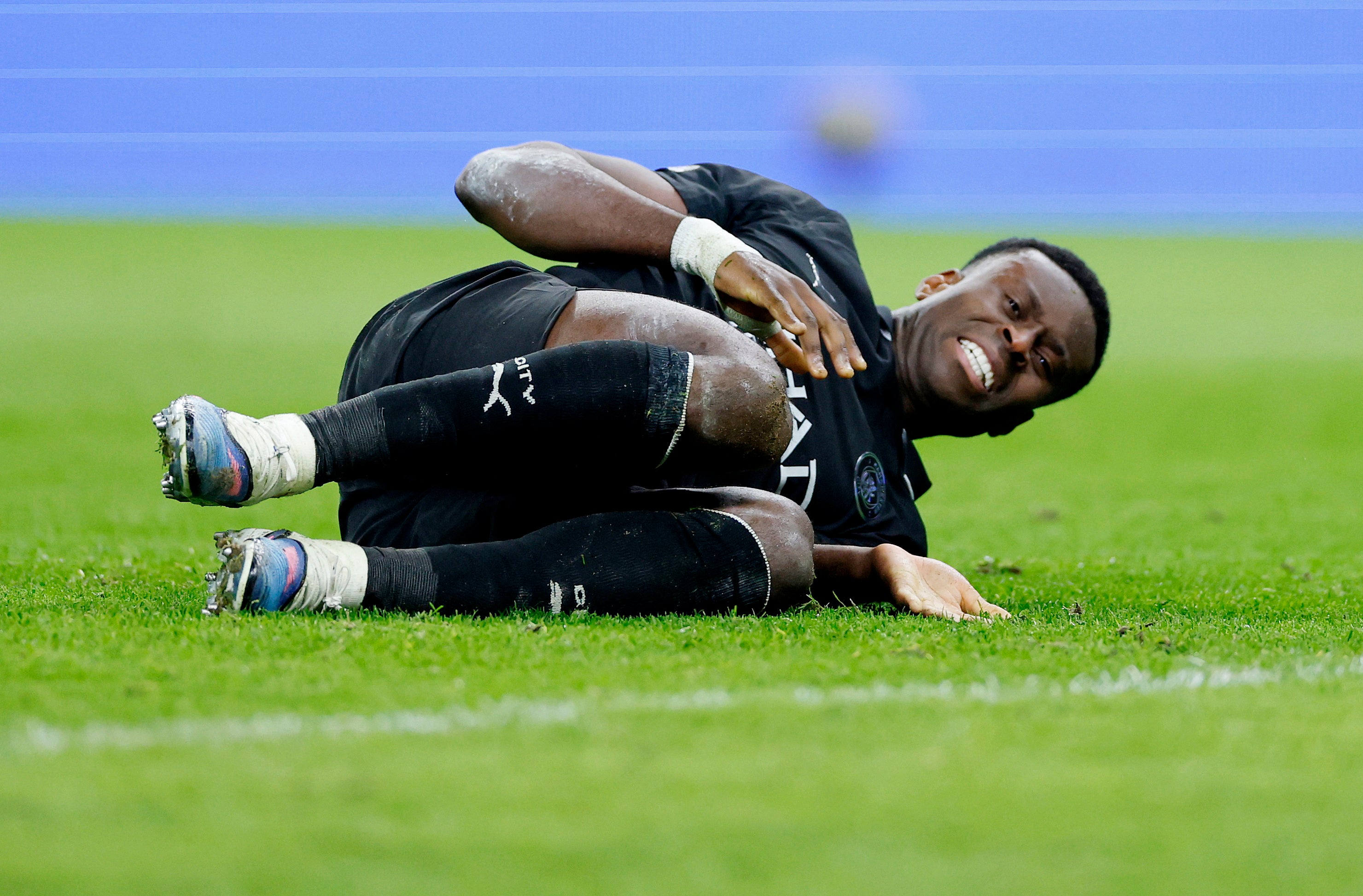 Marc Guehi was left in pain after Dominic Solanke seemed to kick through his leg to score