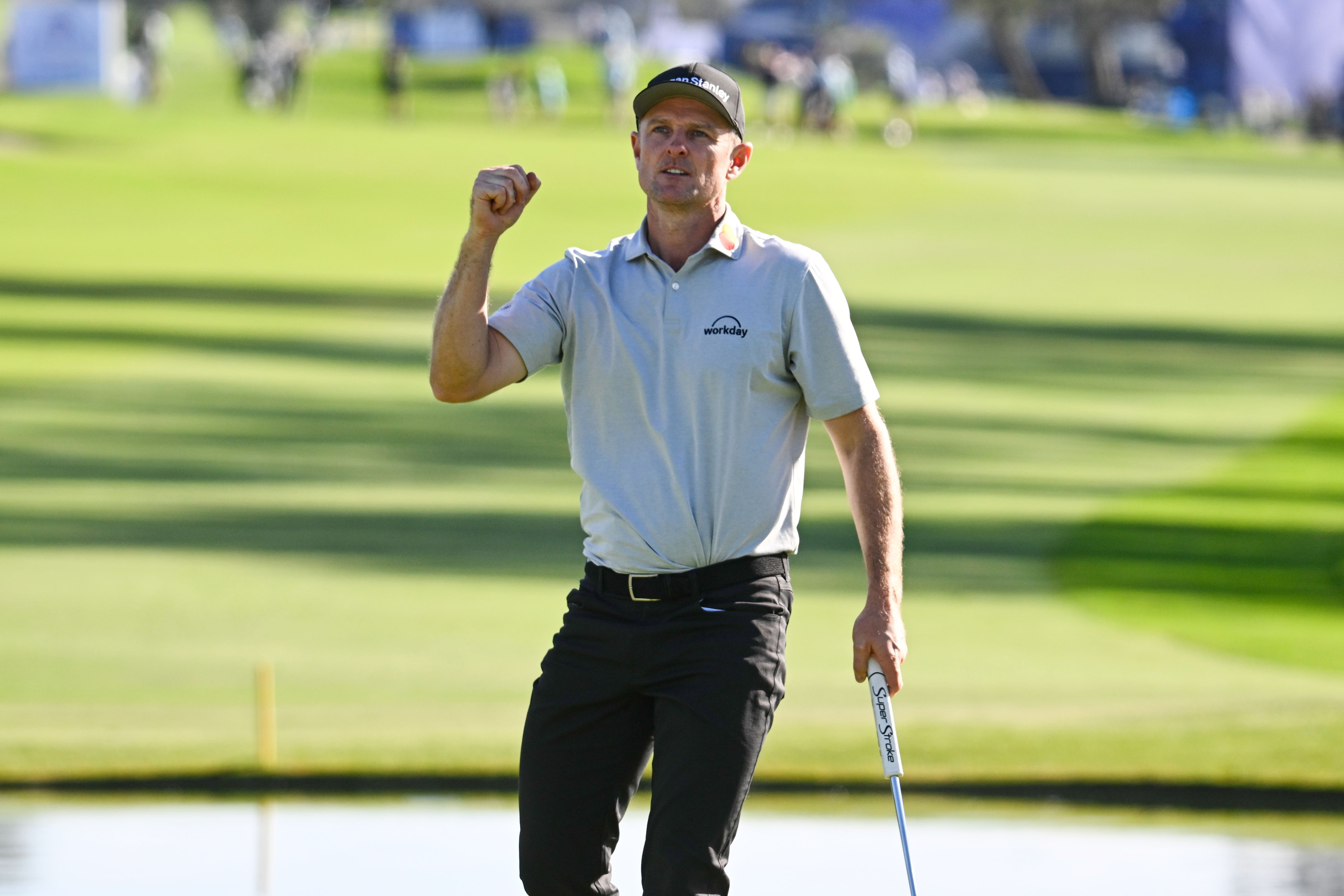 England’s Justin Rose celebrates on the 18th green after winning the Farmers Insurance Open by seven shots (Denis Poroy/AP/PA)