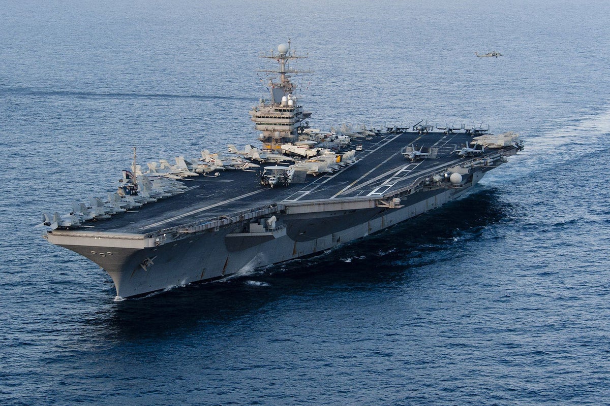 https://static.independent.co.uk/2026/02/01/5/04/Image-provided-by-the-US-Navy-shows-aircraft-carrier-USS-Abraham-Lincoln.jpeg?width=1200&height=800&crop=1200:800