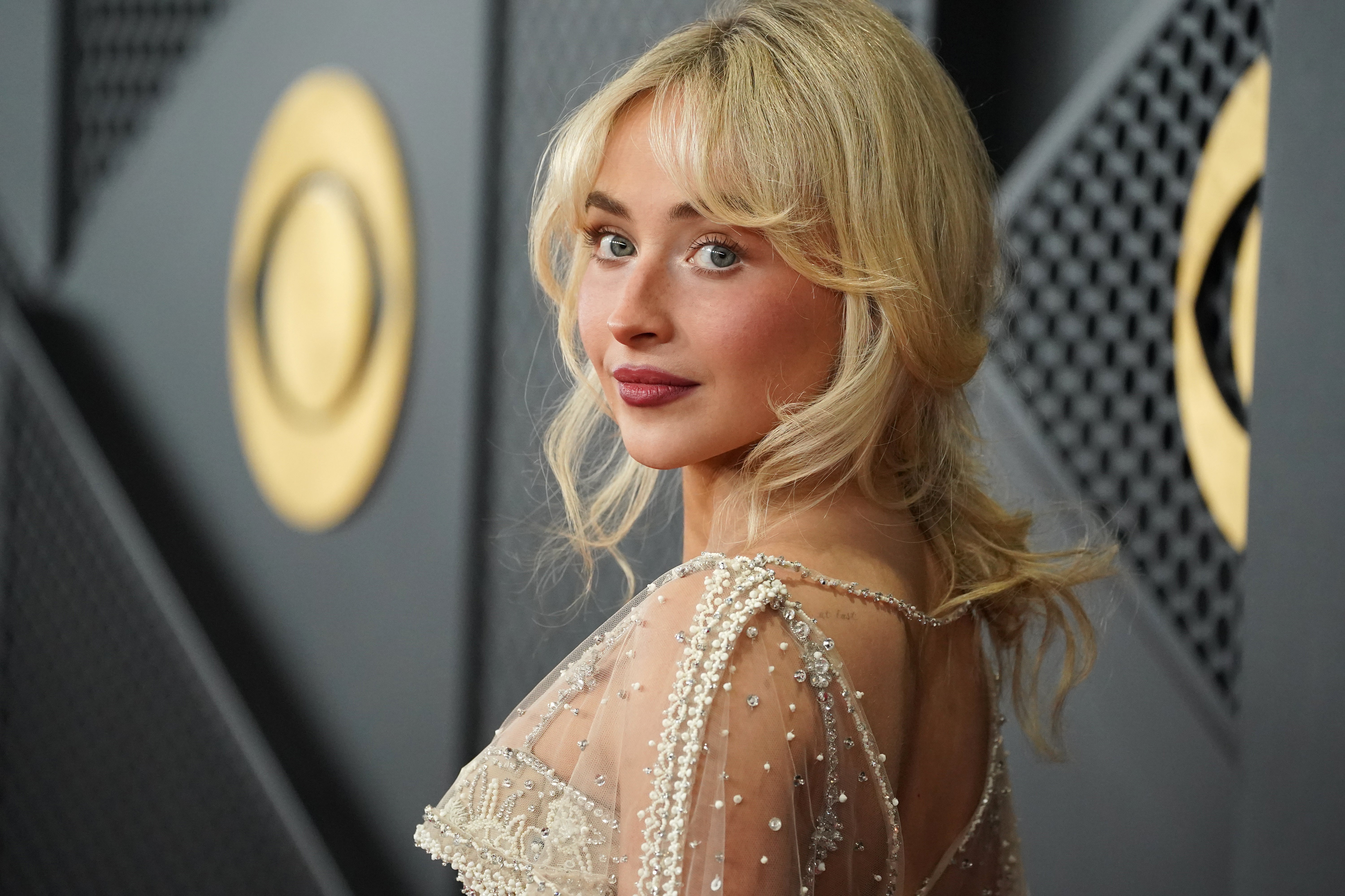 Sabrina Carpenter has ignited debate after pausing her Coachella set to address a fan’s ‘yodeling’