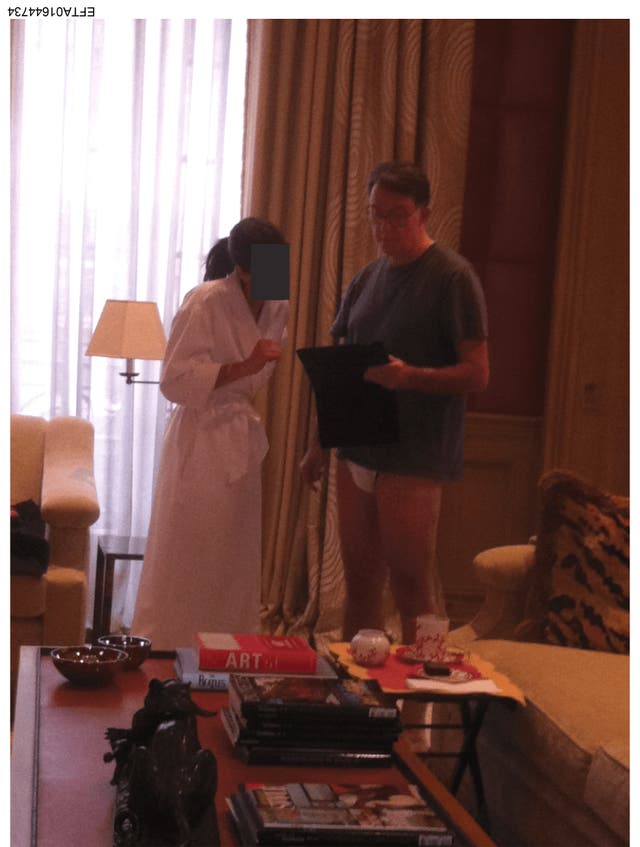 Handout document issued by the US Department of Justice which appears to show Lord Mandelson in his underwear speaking to an unknown person wearing a bathrobe (US Department of Justice/PA)
