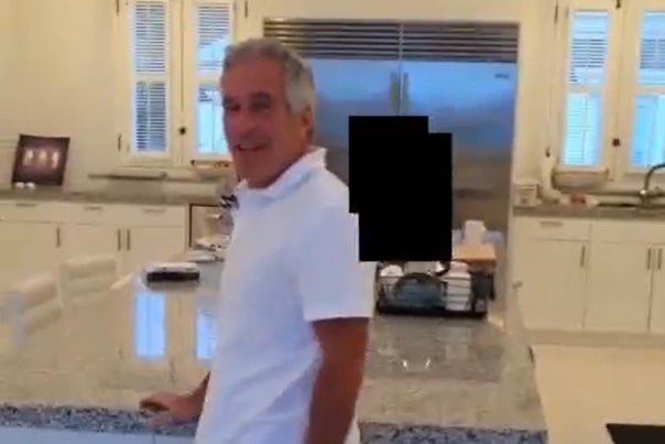 Jeffrey Epstein was pictured on his island, several times, with victims whose faces were redacted by the DOJ