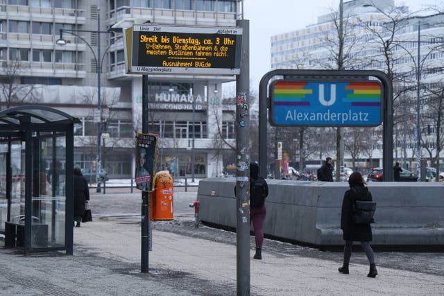 <p>People walk past a closed street tram station at Alexanderplatz during a 24-hour nationwide public transport strike on 2 February, 2026 in Berlin, Germany</p>