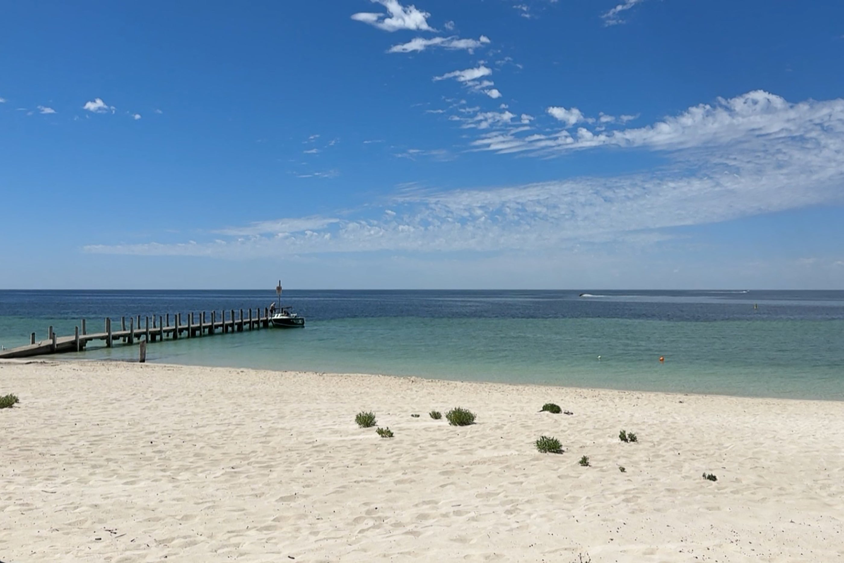 Screengrab from ABC footage shows the beach in Quindalup where Austin Appelbee, 13, swam for four hours through choppy waters to get help for his family