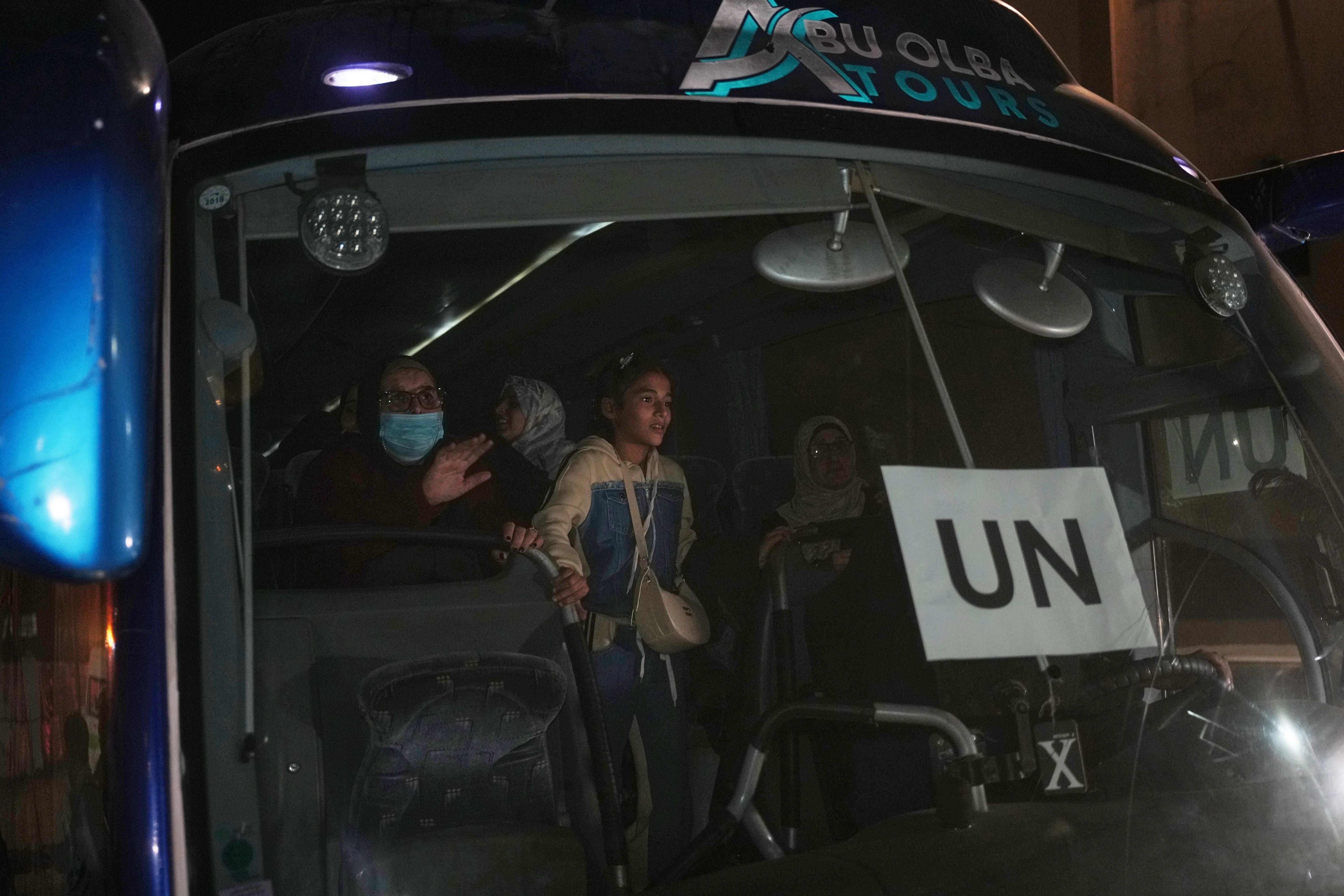A bus arrives at Nasser Hospital following the long-awaited reopening of the Rafah border crossing