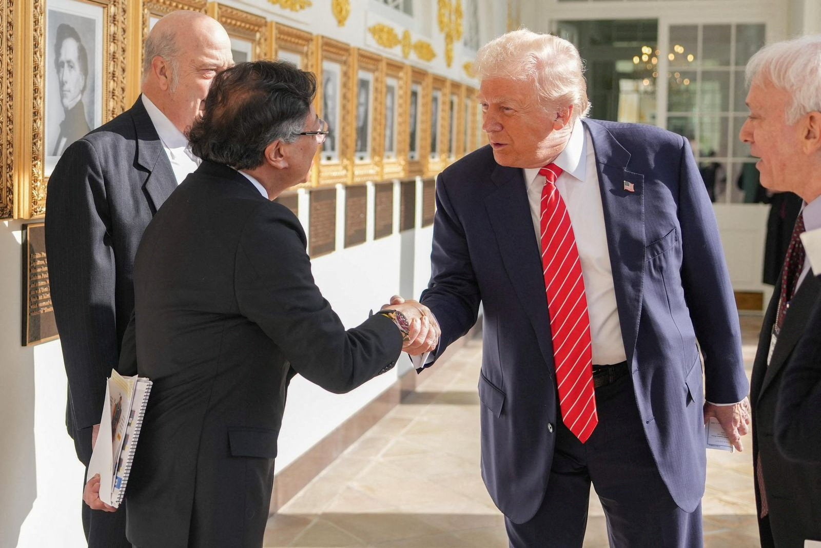 U.S. President Donald Trump and his Colombian counterpart Gustavo Petro shake hands at the White House, in Washington, D.C., U.S., February 3, 2026