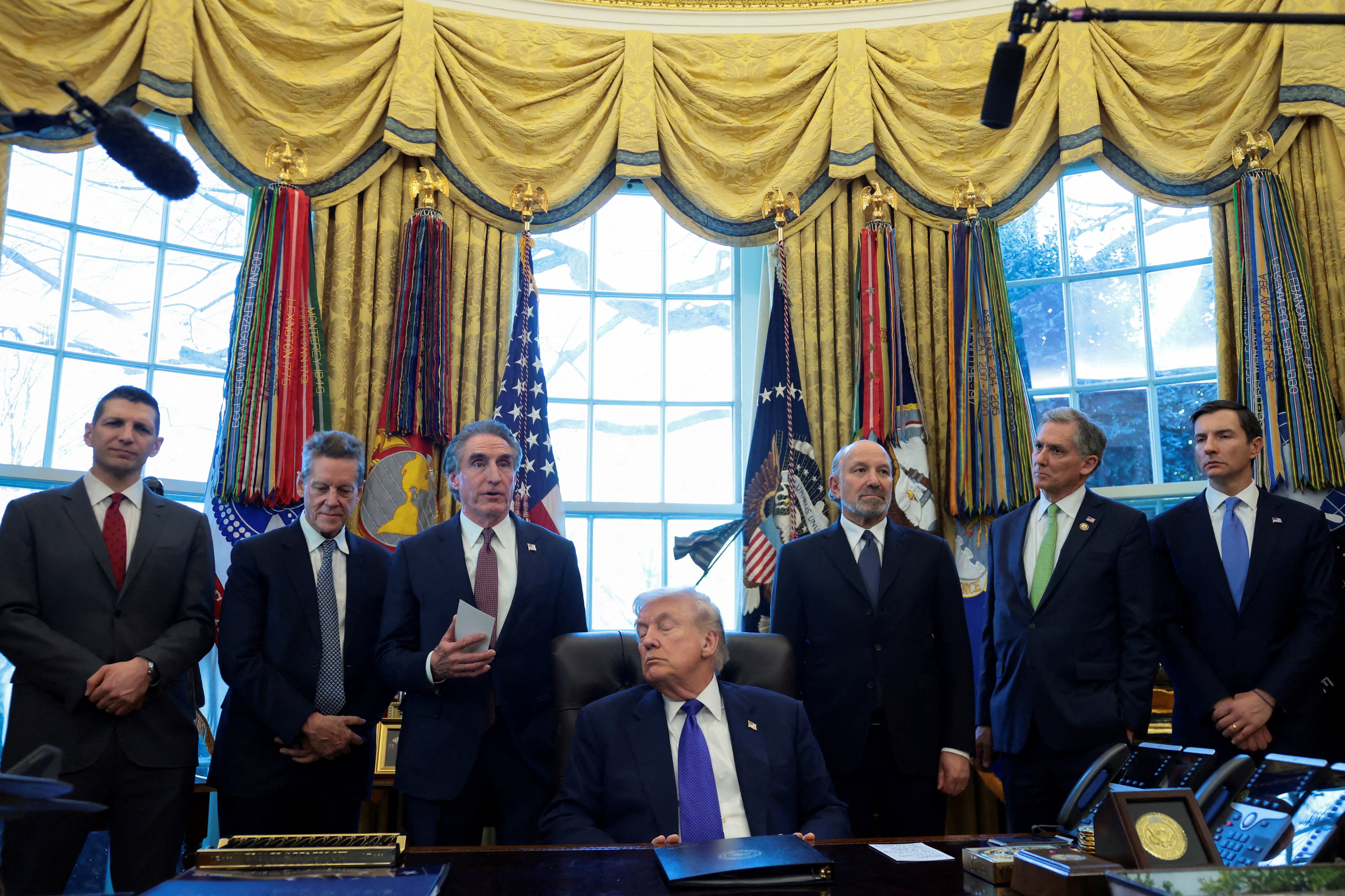 Donald Trump attends the announcement of the creation of a critical mineral reserve in the Oval Office at the White House