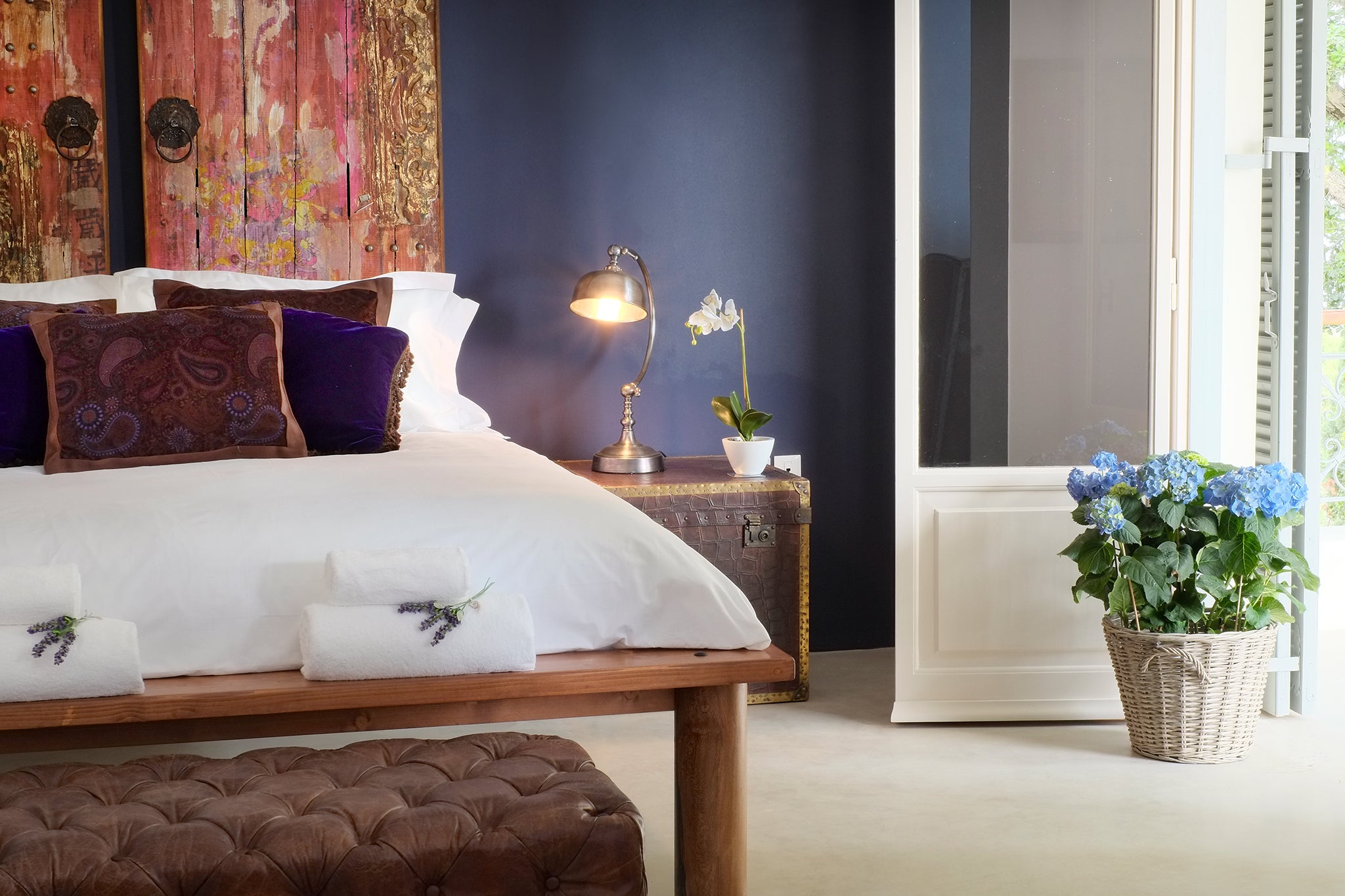 The Purple Rain suite has a balcony overlooking olive groves and the Ionian sea