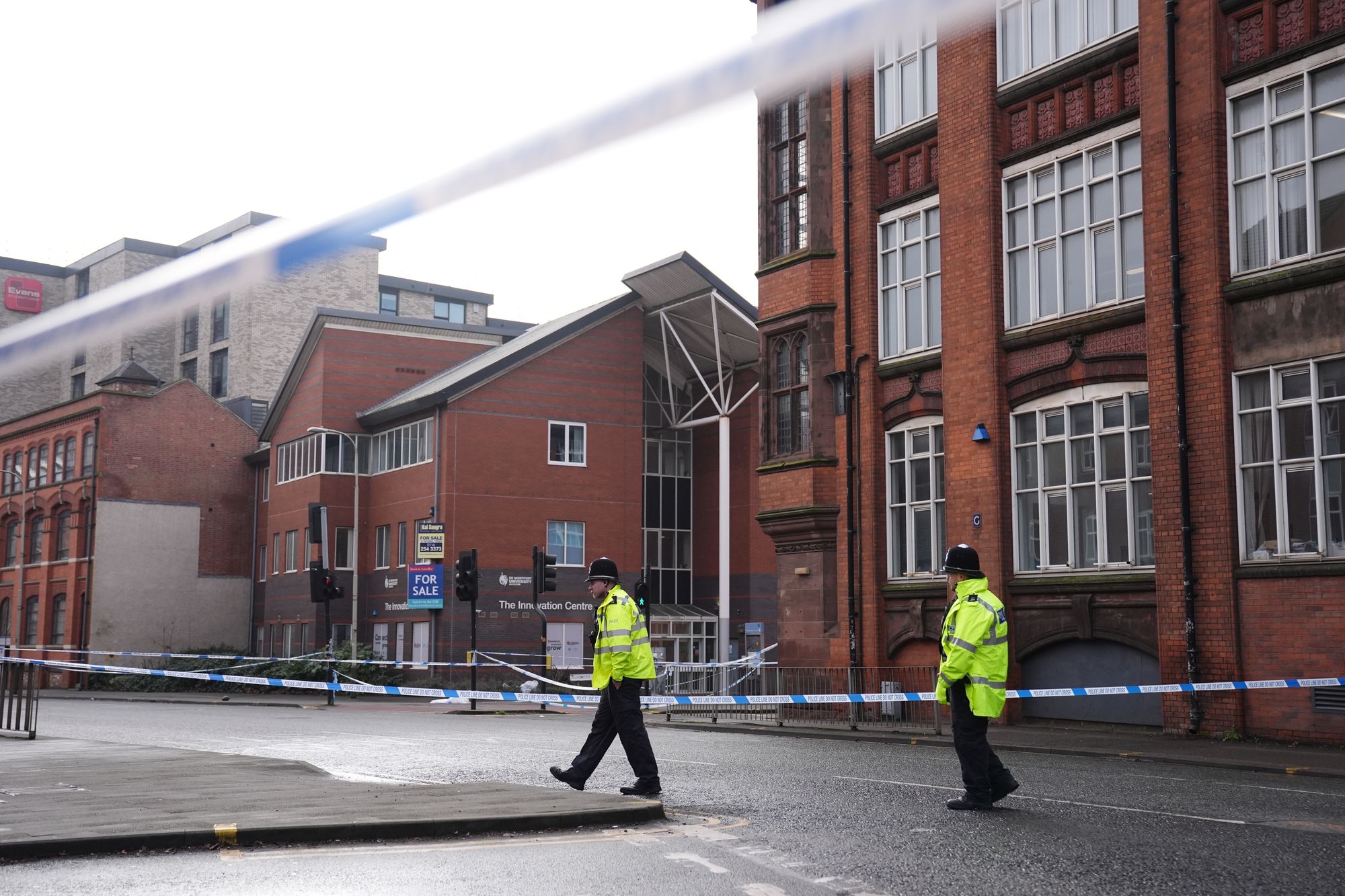 Police at the scene at the campus of De Montfort University in Leicester, after an 18-year-old man was arrested on suspicion of murder