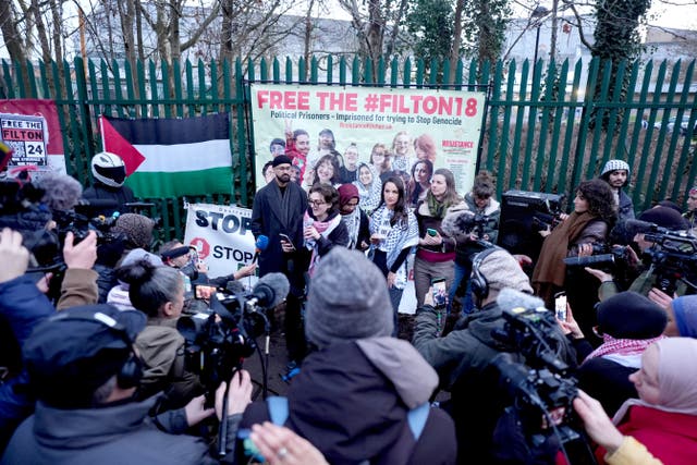 <p>Zoe Rogers, one of the six Palestine Action activists, addresses the media and supporters outside Woolwich Crown Court, London, after her and fellow activists were cleared of committing aggravated burglary </p>