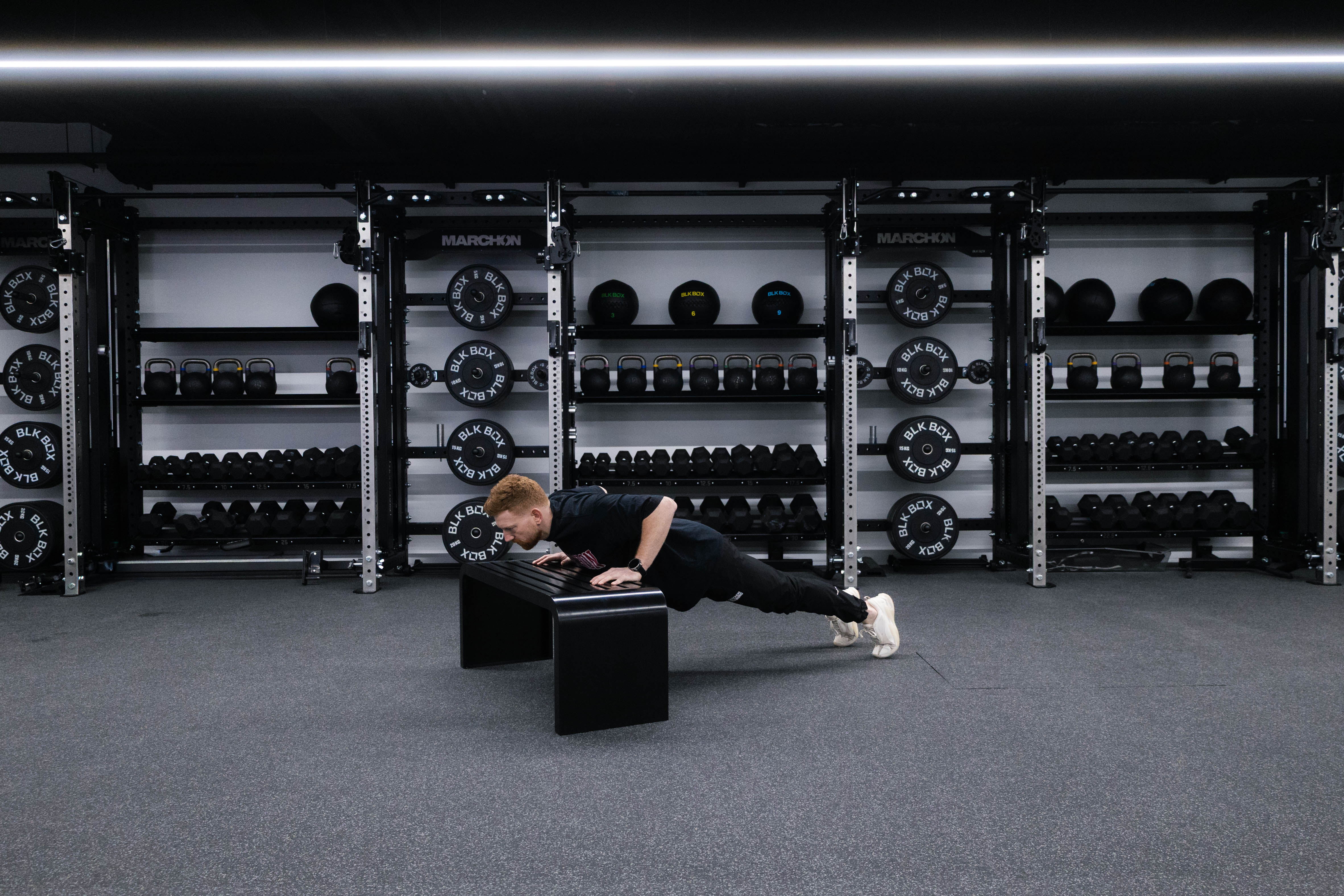 Marchon coach Patrick James demonstrating a hands-elevated press-up