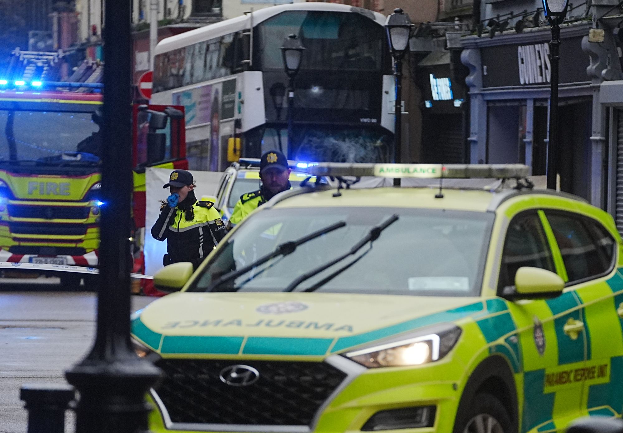 The front window of the double-decker bus was smashed