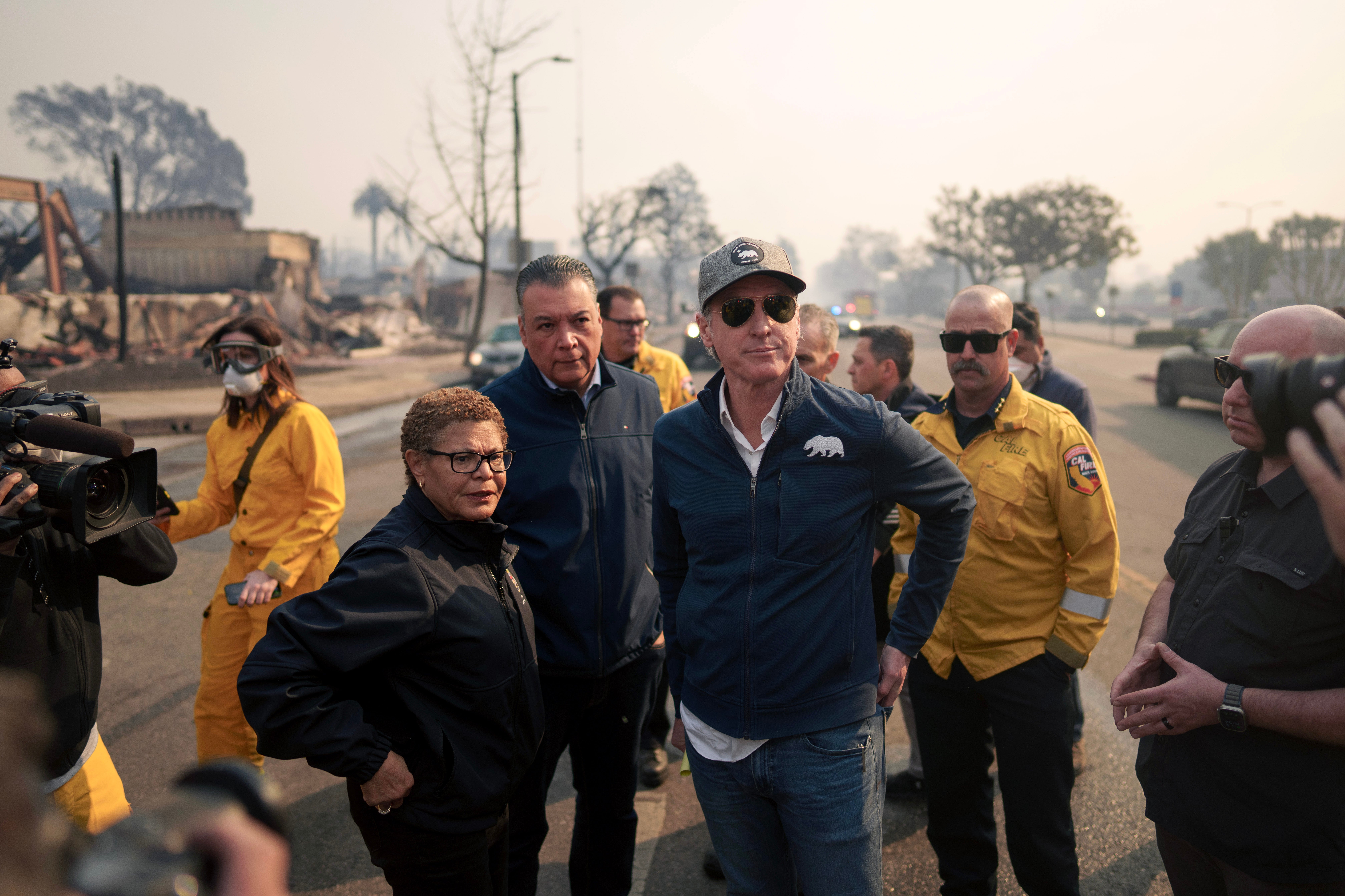 <p>California Governor Gavin Newsom and Los Angeles Mayor Karen Bass tour the downtown business district of Pacific Palisades as the Palisades Fire continues to burn on January 8, 2025 in Los Angeles, California</p>