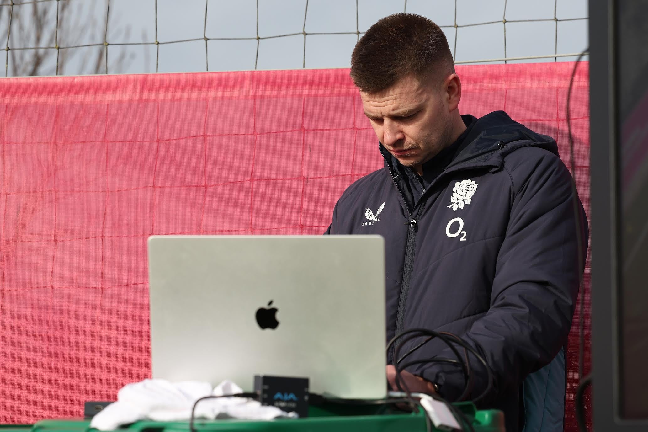 England staff member using an Apple MacBook during the England training camp at Hotel Camiral de Caldes de Malavella on January 28, 2026 in Girona, Spain