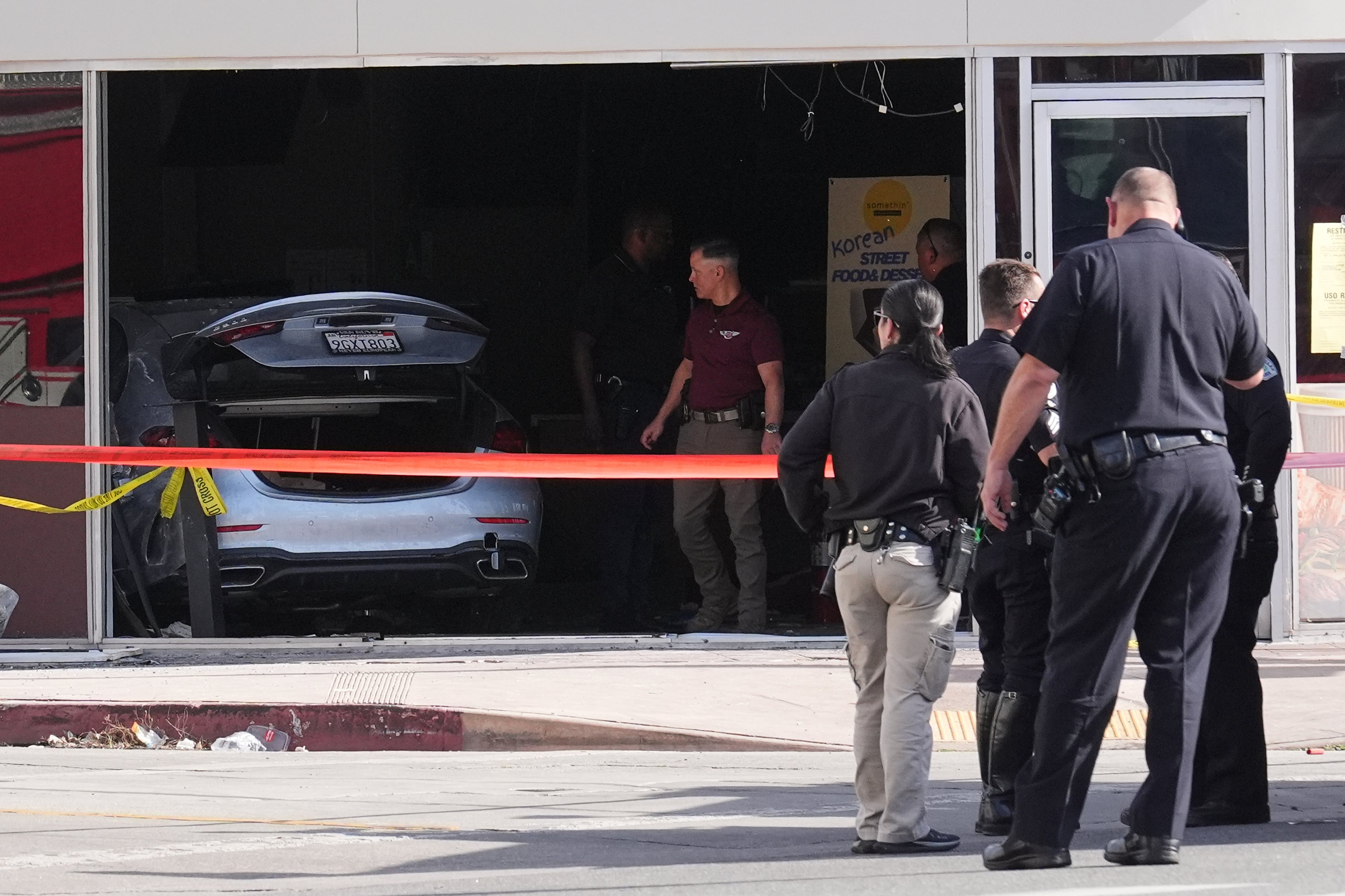 TV news footage showed a silver sedan with its trunk open fully inside the store on Westwood Boulevard.