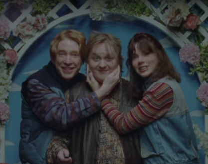 Taylor Swift with Domhall Gleeson (left) and Lewis Capaldi in the 'Opalite' music video