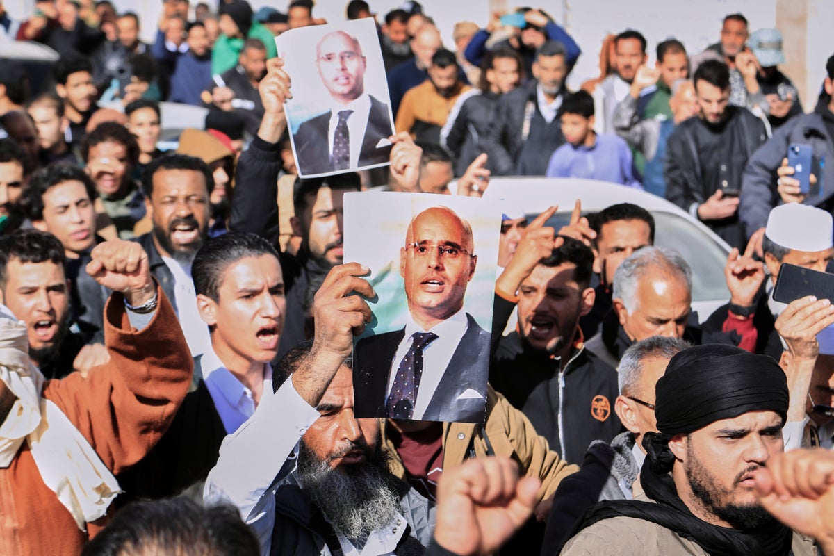 Thousands of Libyans gather for the funeral of Gadhafi’s son who was shot and killed this week