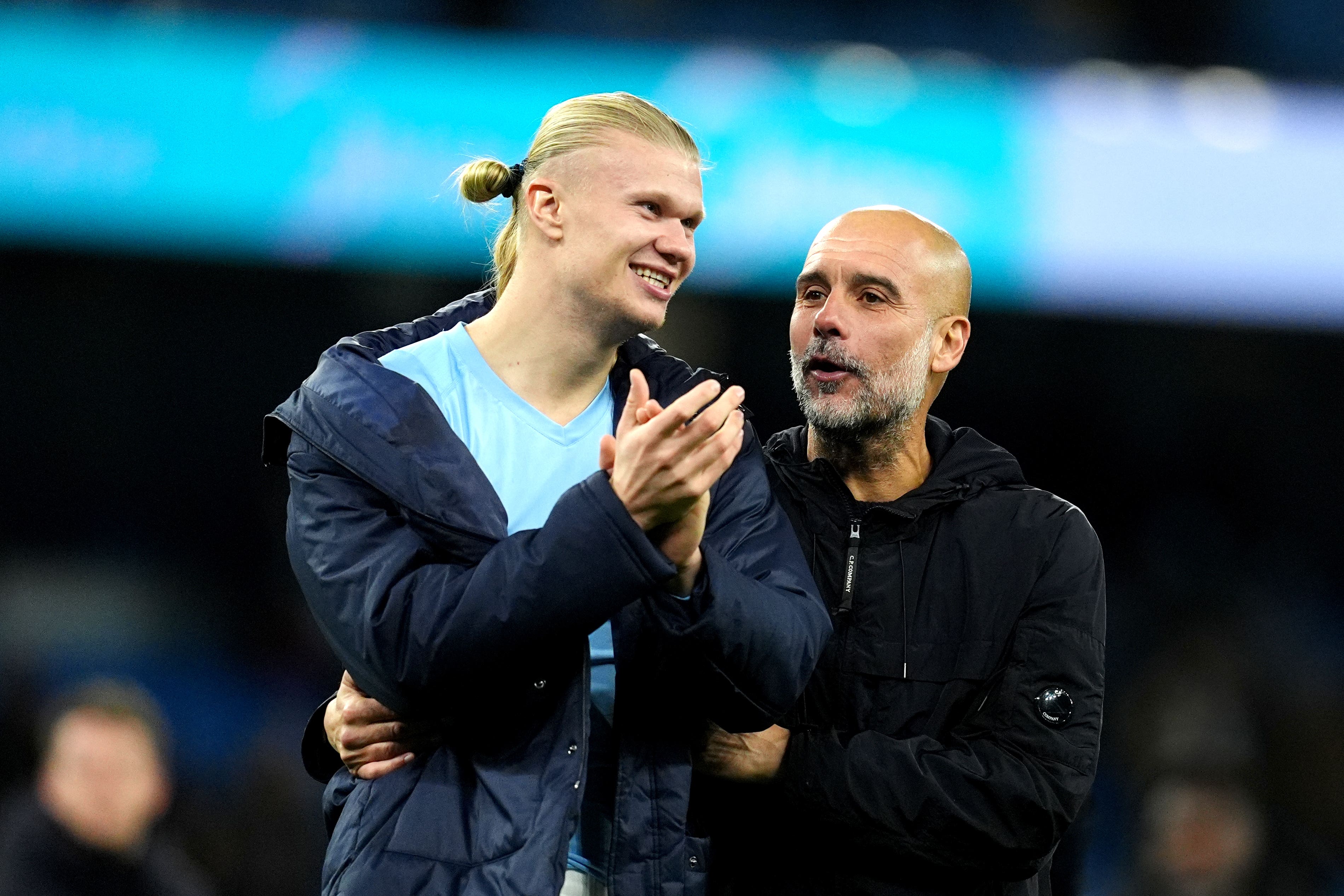 Pep Guardiola (right) believes Erling Haaland is the best striker in the world (Martin Rickett/PA)