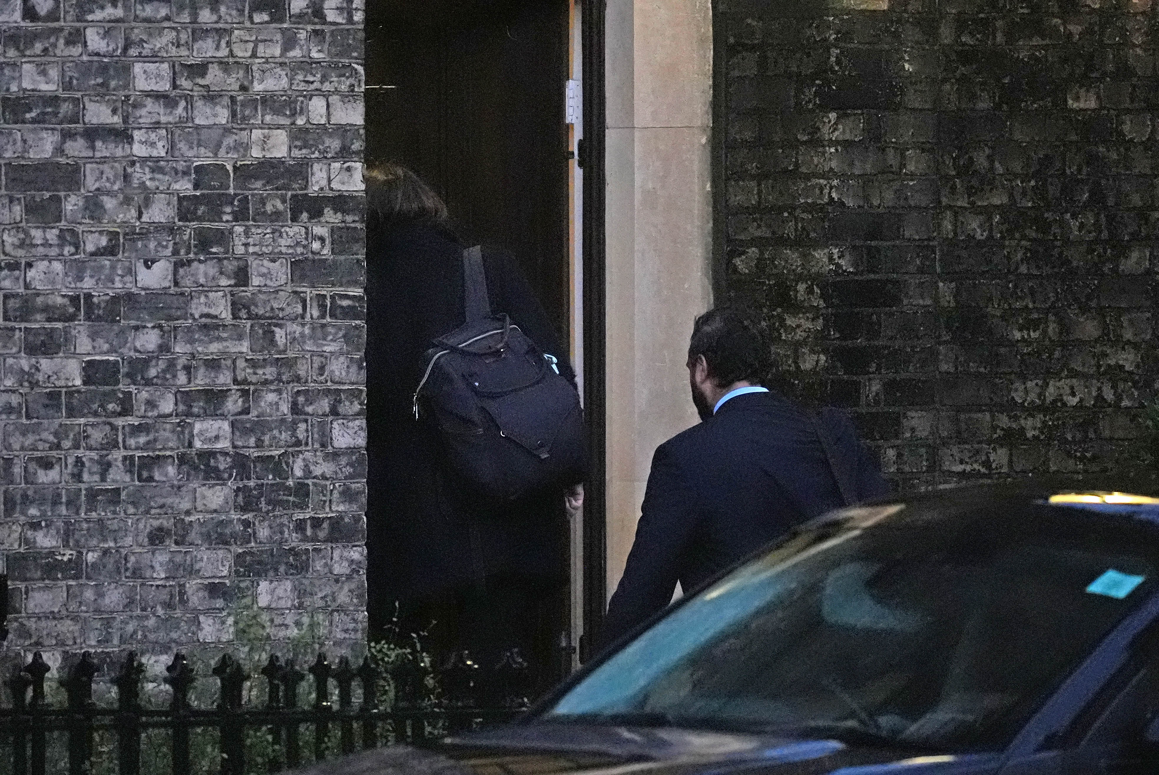 Two people enter the home of Lord Peter Mandelson in north west London