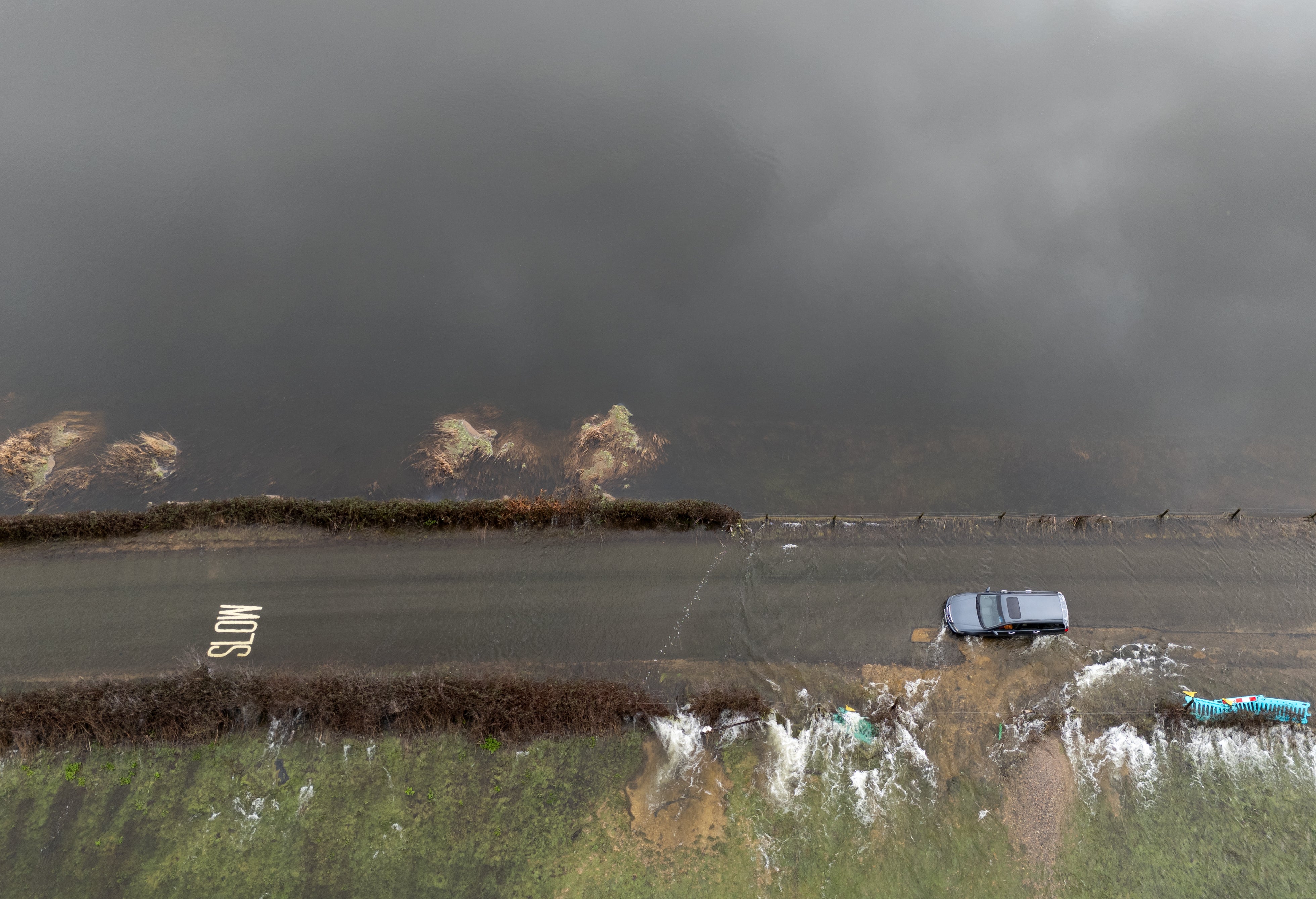 Flood waters cover a road near Harbridge, Hampshire