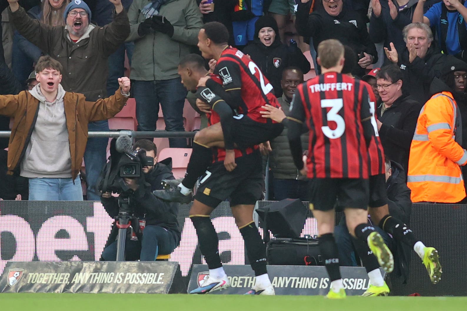 Rayan (left) celebrates with Eli Junior Kroupi after scoring his first goal for Bournemouth (Peter Tarry/PA)
