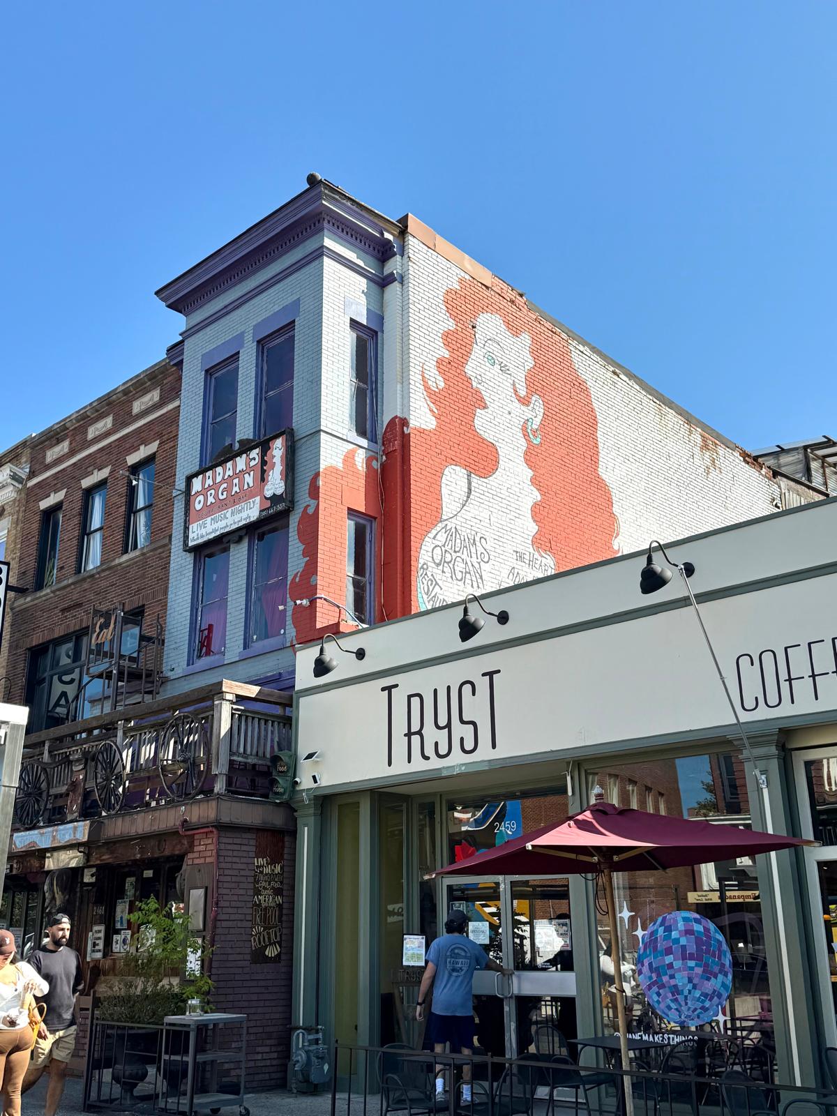 The mural on the side of the Madam's Organ Blues Bar has been there since 1997