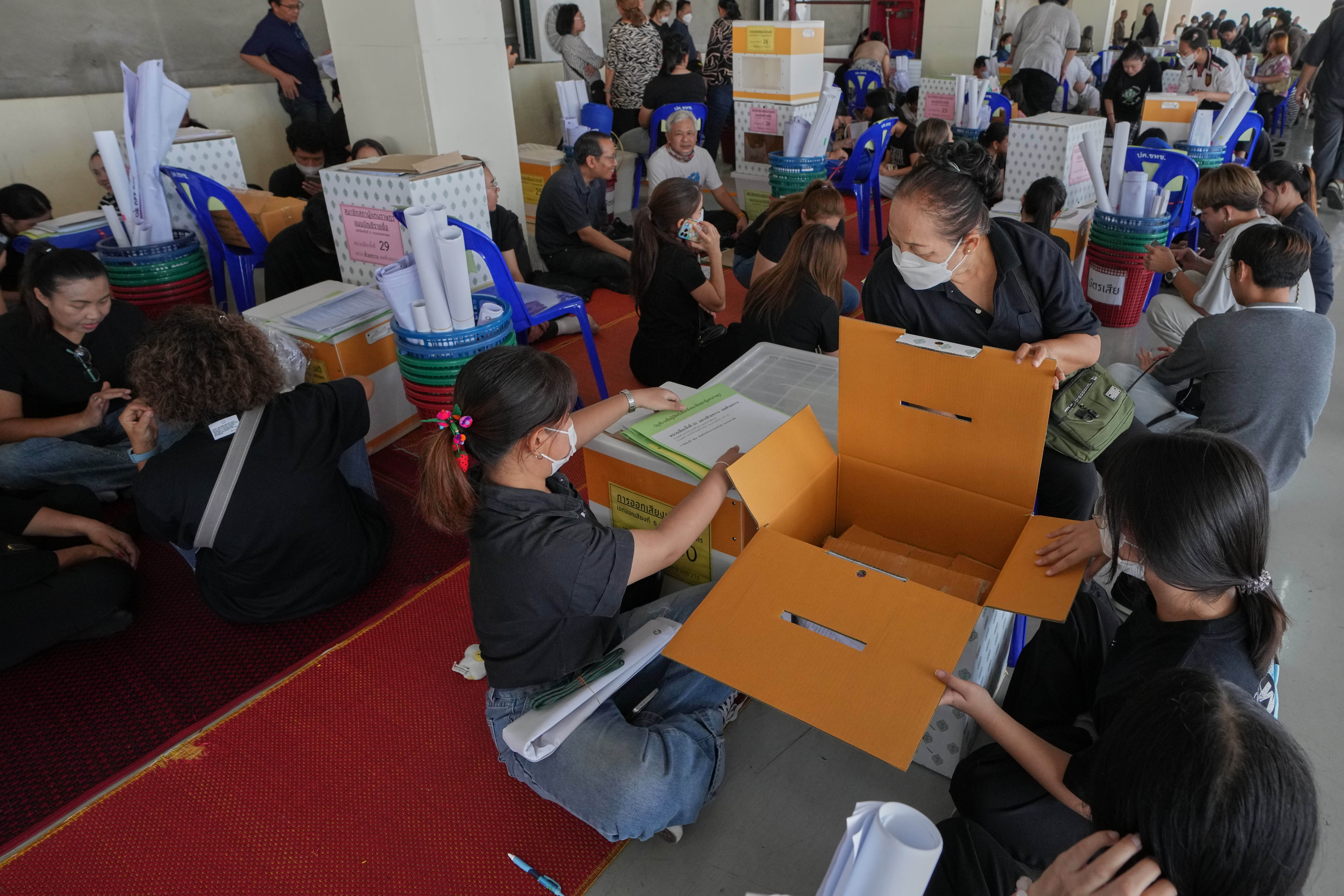 Volunteers check equipment and prepare ballot boxes for Sunday's general election in Bangkok, Thailand, Saturday, 7 Feb 2026