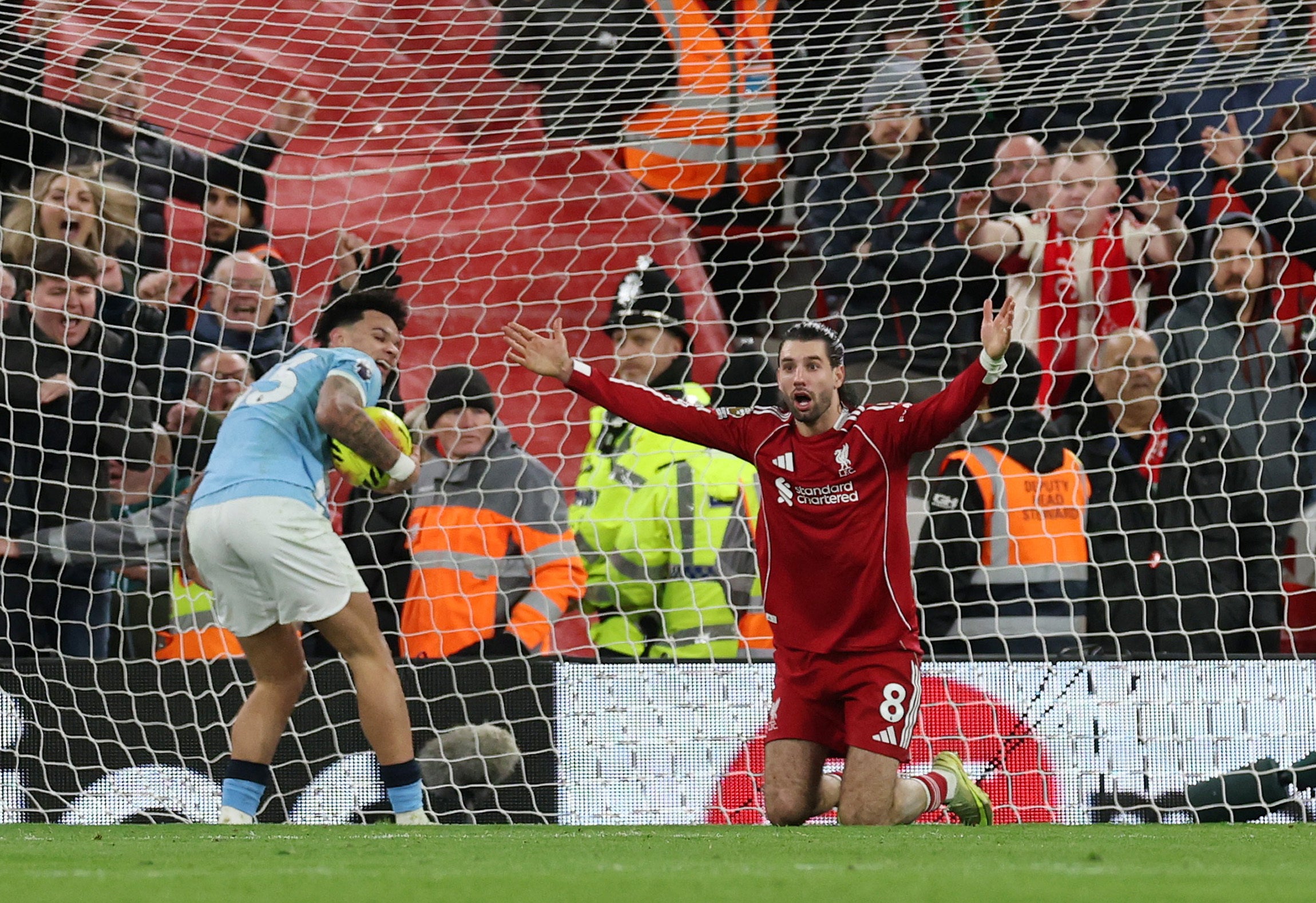 Dominik Szoboszlai appeals for a foul after City find the net in added time
