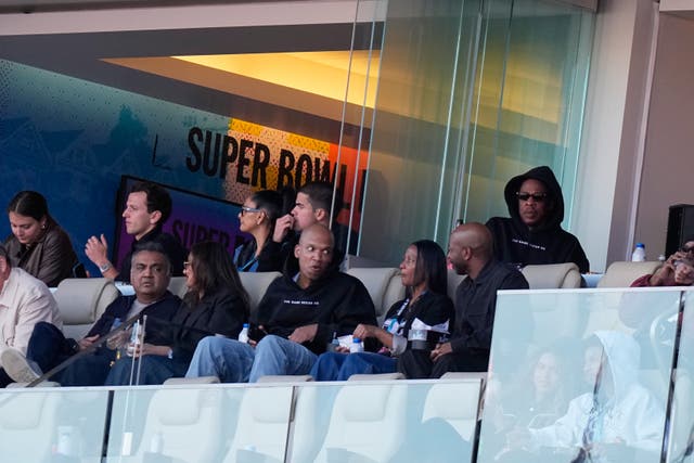 <p>Jay-Z, back right, attends the NFL Super Bowl 60 football game between the Seattle Seahawks and the New England Patriots,</p>