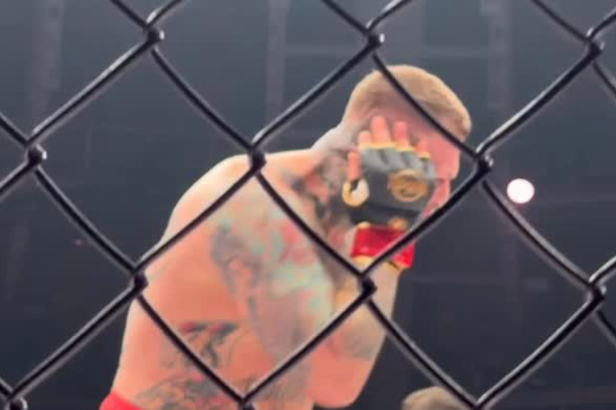 MMA fighter attacked by crowd after biting opponent’s ear in chaotic scenes MMA fighter attacked by crowd after biting opponent’s ear in chaotic scenes