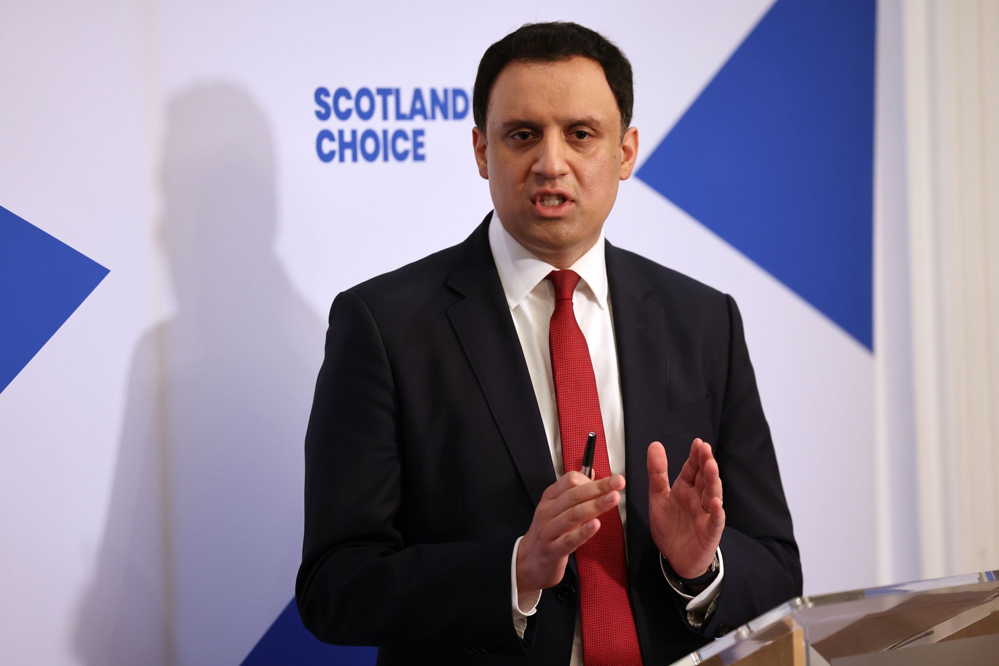 Anas Sarwar appeared at a press conference infront of a backdrop that made no mention of Labour