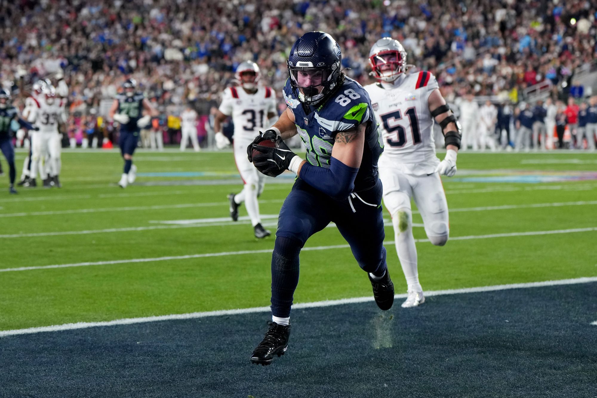 Seattle Seahawks tight end AJ Barner catches a touchdown pass