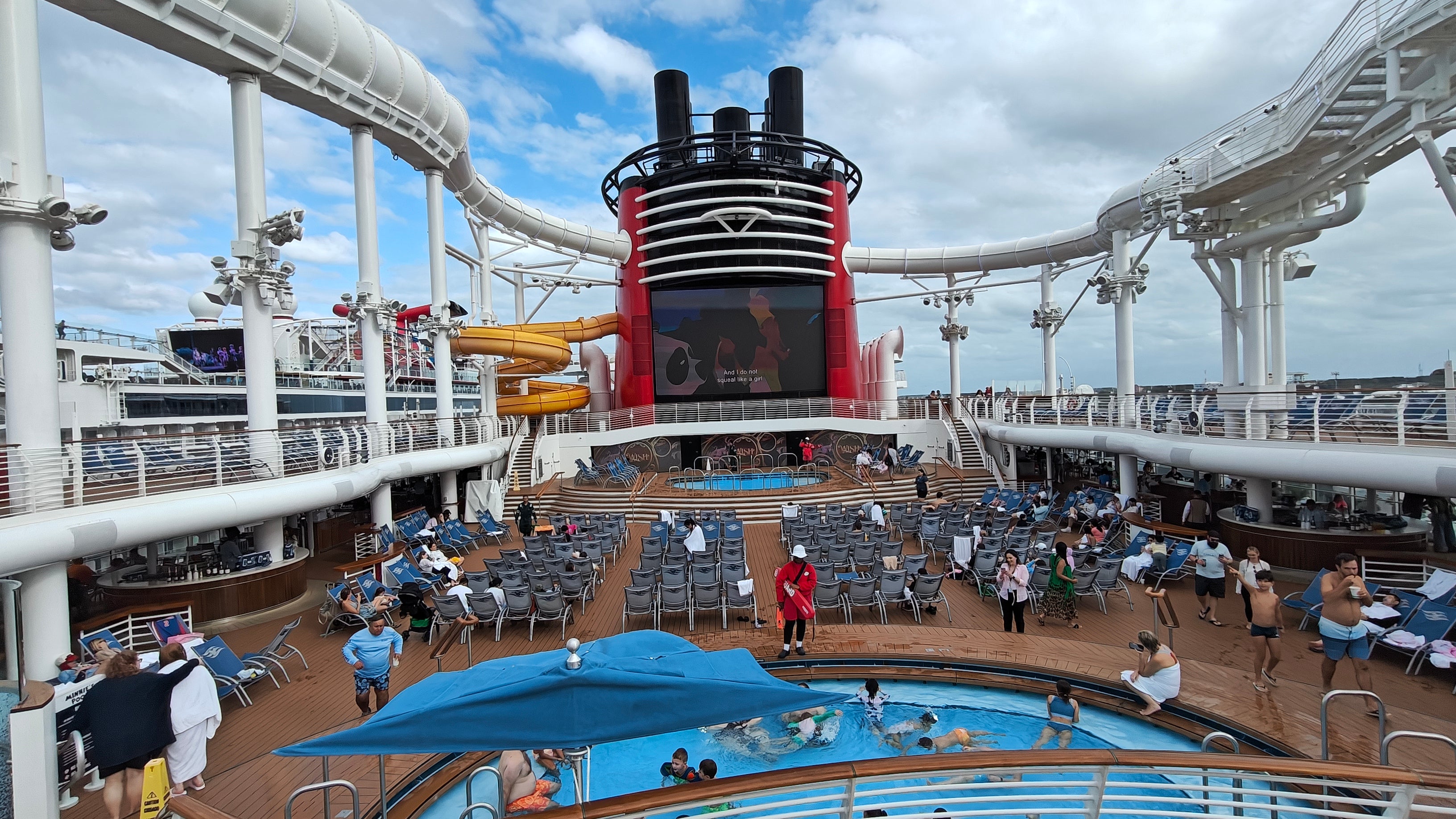 Guests can swim while watching Disney movies or have a go on the AquaMouse that takes them on a water ride through white tubes around the ship