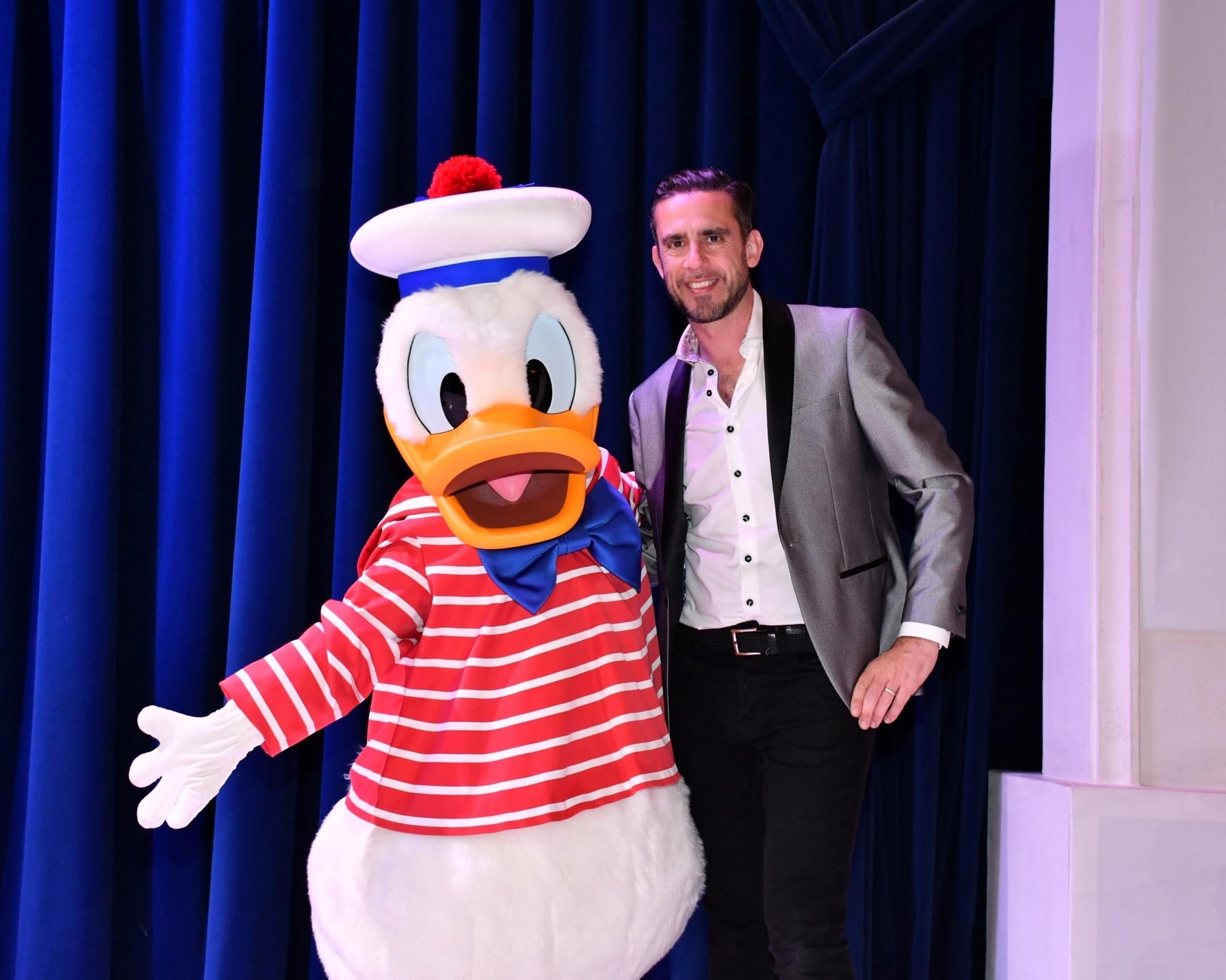 Marc Shoffman met his favourite Disney character Donald Duck aboard Disney Wish