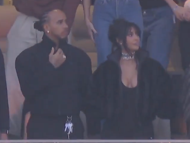 <p>Kim Kardashian and Lewis Hamilton are pictured during their first public outing together at the Super Bowl</p>