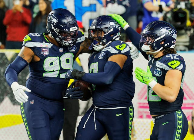 <p>Seattle Seahawks' Uchenna Nwosu celebrates scoring</p>