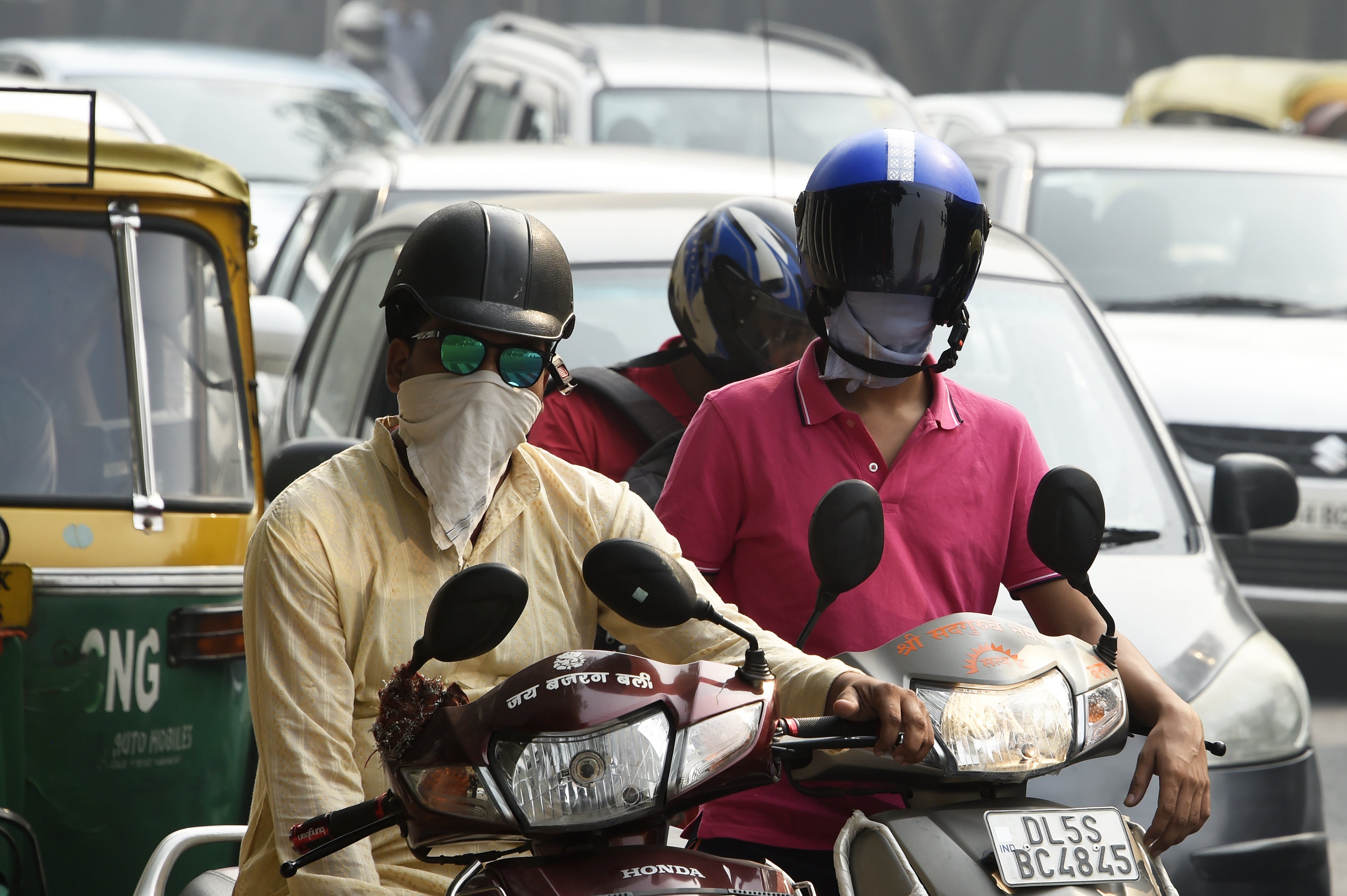 <p>Representative: Indian bikers wearing helmet as they navigate Delhi traffic</p>
