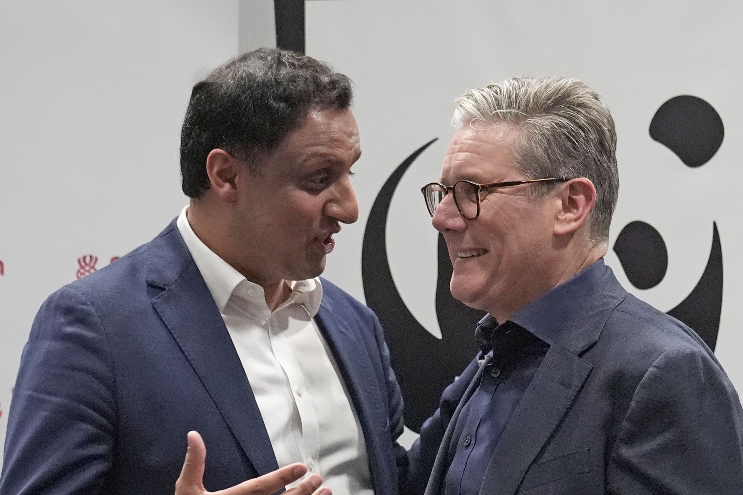 Anas Sarwar (left) called for Sir Keir Starmer (right) to step down (Peter Byrne/PA)