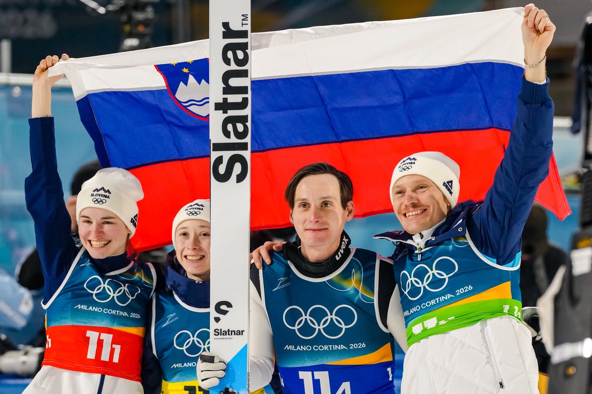 Slovenian siblings Domen and Nika Prevc win Olympic gold in ski jumping team event