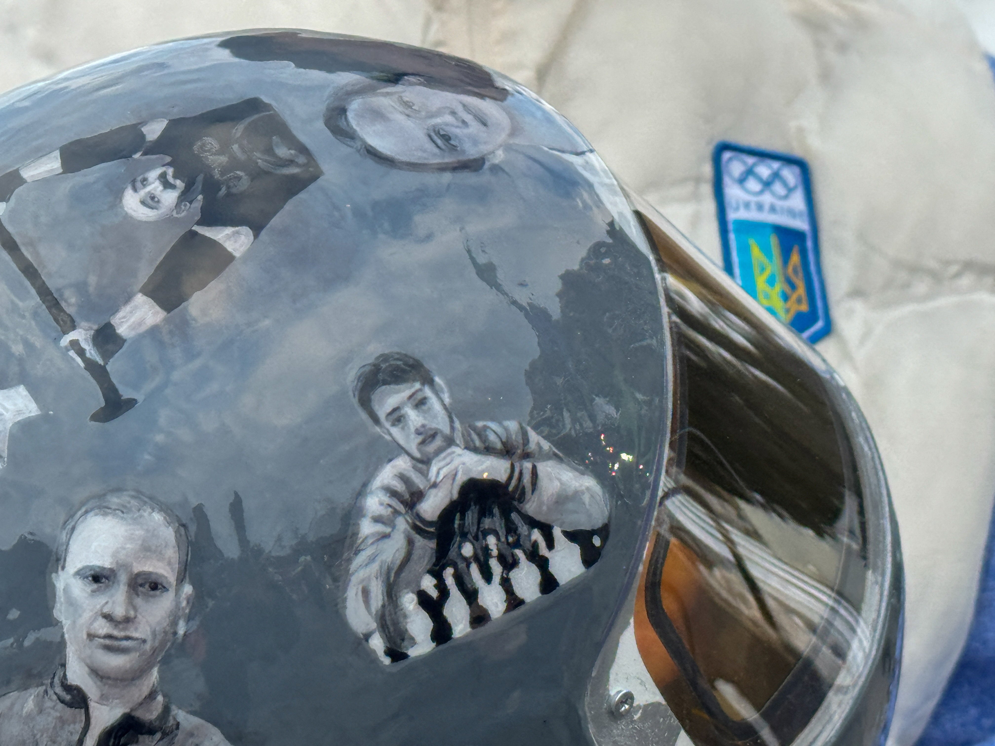 Ukrainian skeleton athlete Vladyslav Heraskevych's helmet with images of compatriots killed during the war in Ukraine, at the Milano Cortina Gamesin