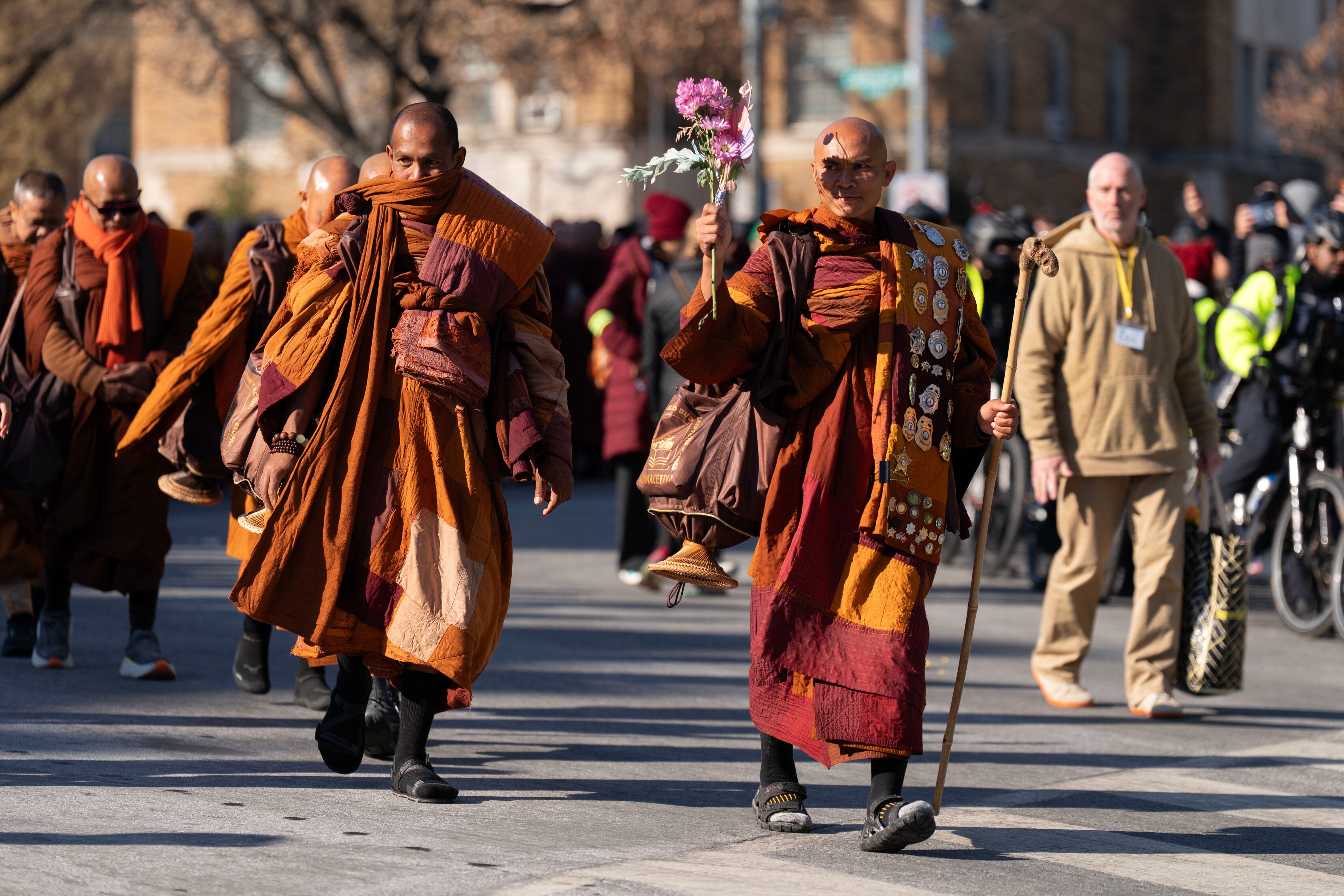 <p>The trek has had its perils – one monk had to have a leg amputated after being injured</p>