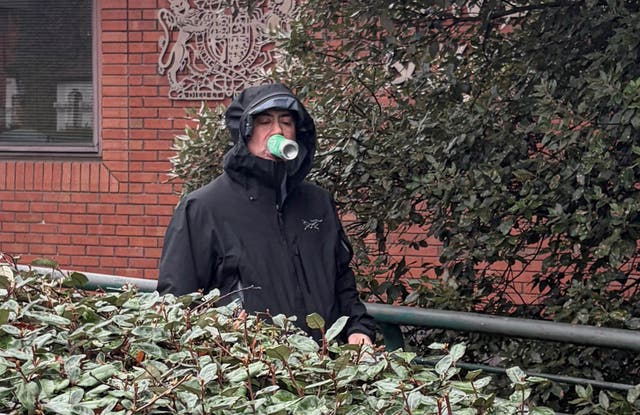 <p>Dr Martin Kuper leaves Wimbledon Magistrates' Court. He is accused of exposing himself in front of the woman as she enjoyed the sunshine in Battersea Park last April</p>