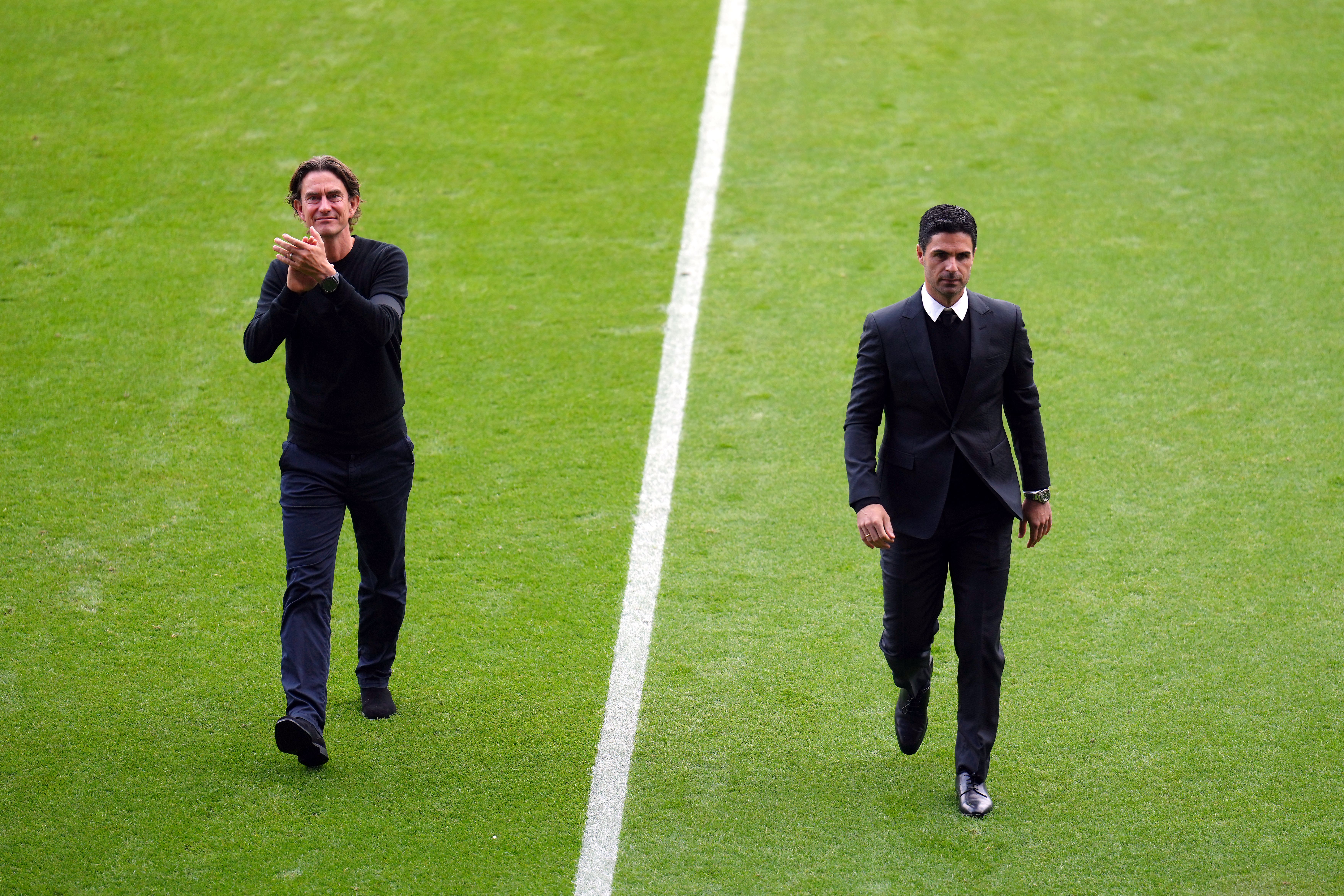 Thomas Frank (left) and Arsenal manager Mikel Arteta (John Walton/PA)